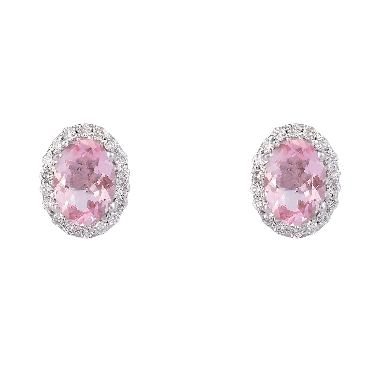 This is a natural Morganite stud earring with diamonds and 18k gold. The Morganite is very high quality and very good quality diamonds the clarity is vsi and G color

Item Details:
Gross Weight:- 3.110 Grams
18k White Gold Weight:- 2.808