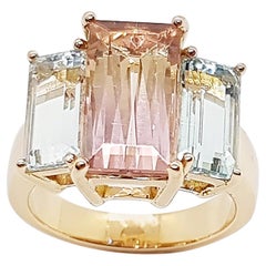 Bague en or rose 18 carats sertie d'une morganite et d'une aigue-marine