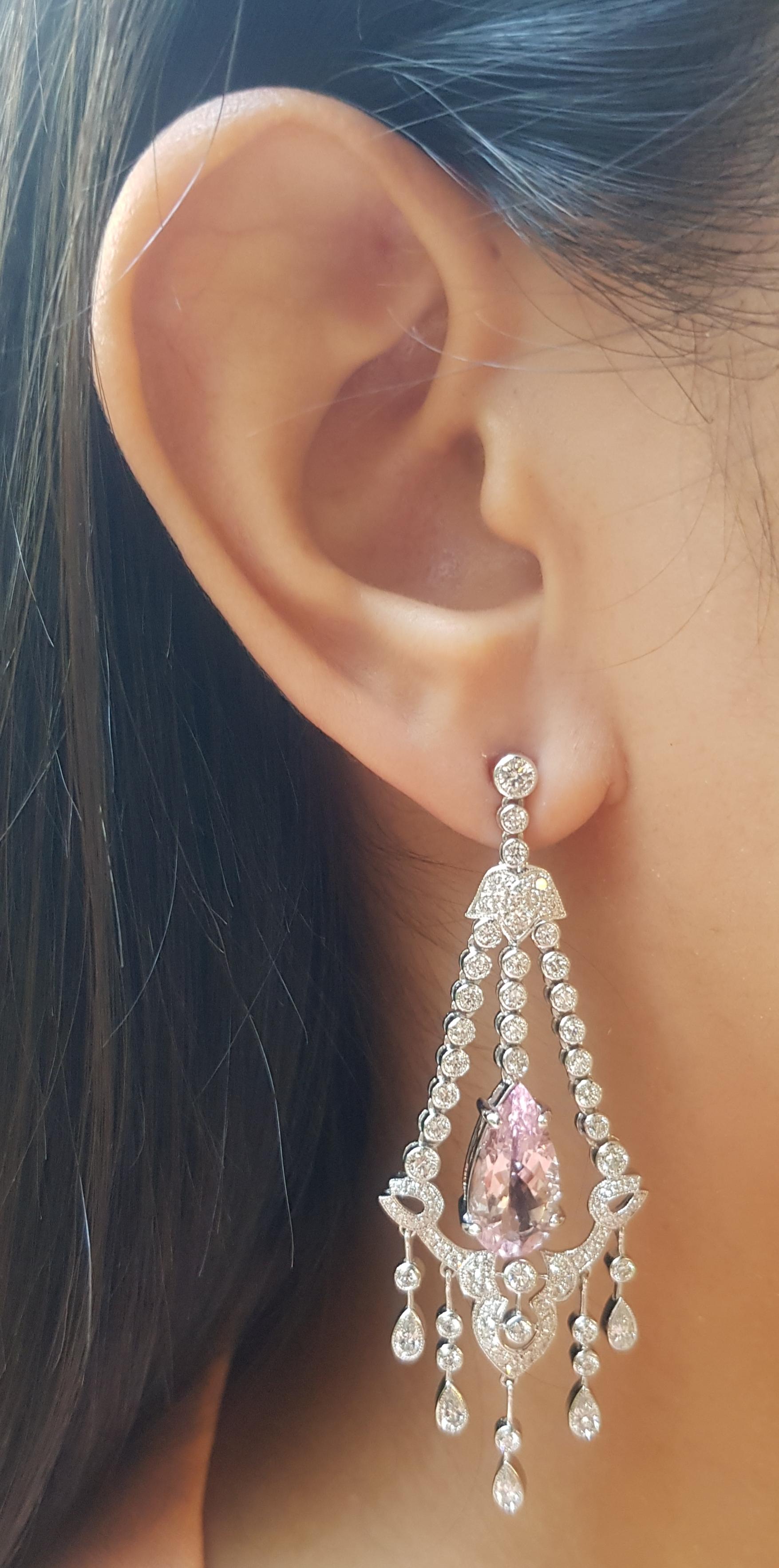Morganite 7.25 carats with Diamond 3.70 carats Earrings set in 18K White Gold Settings

Width: 2.3 cm 
Length: 6.4 cm
Total Weight: 20.35 grams

