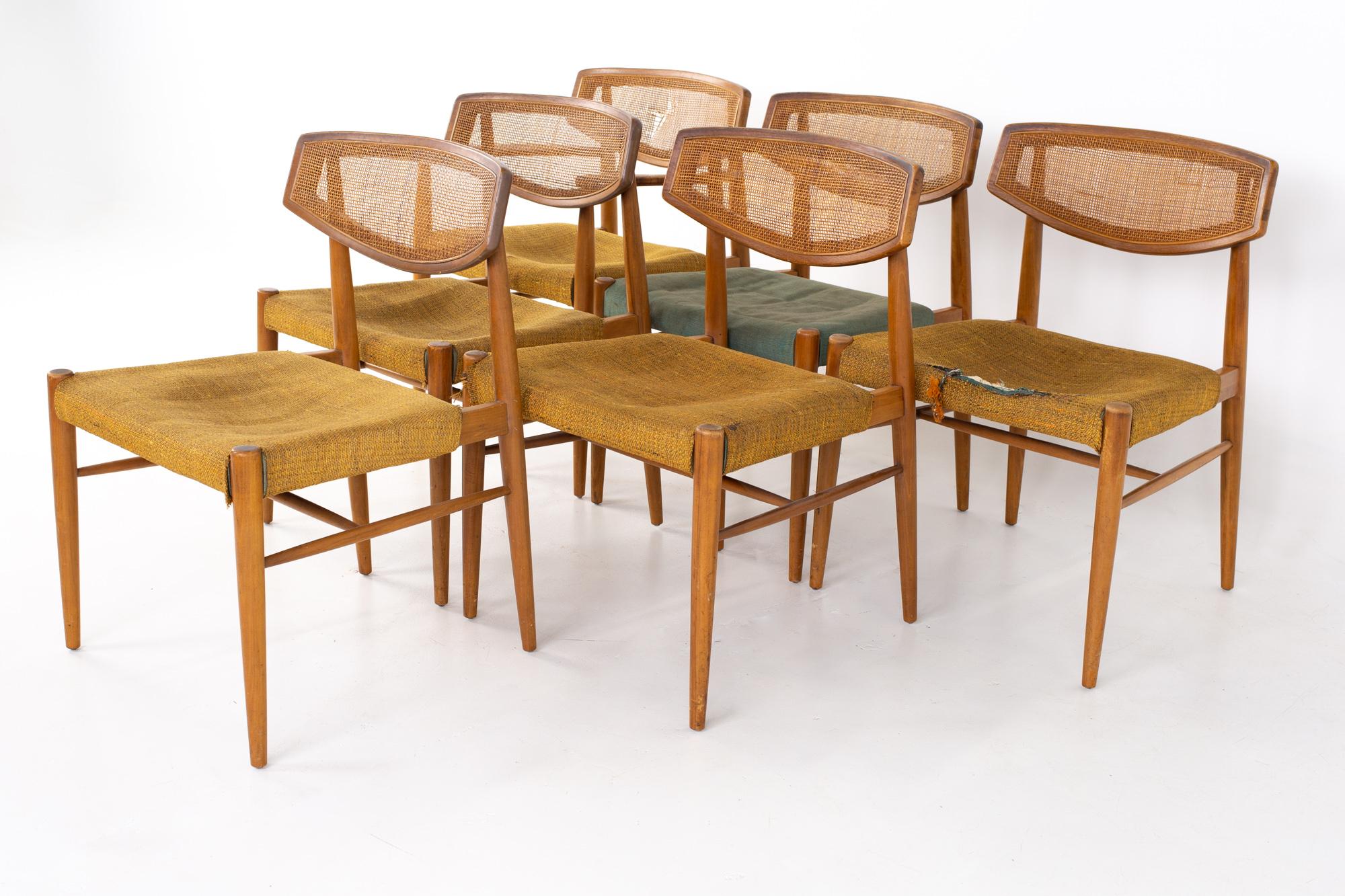 Morganton mid century walnut cane back cats eye dining chairs - set of 6.
Each chair measures: 22.5 wide x 22 deep x 31 high, with a seat height of 17 inches 

All pieces of furniture can be had in what we call restored vintage condition. That