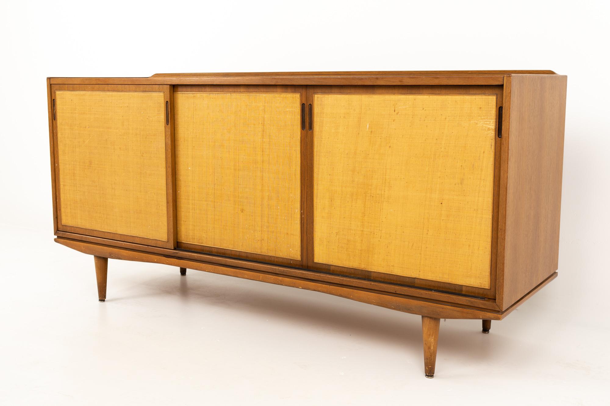 Morganton midcentury walnut and cane sideboard buffet credenza
Measures 66 wide x 20 deep x 32.25 inches high

All pieces of furniture can be had in what we call restored vintage condition. This means the piece is restored upon purchase so it’s