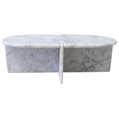 Morini Table in Bianco Carrara Honed designed by INC Architecture & Design