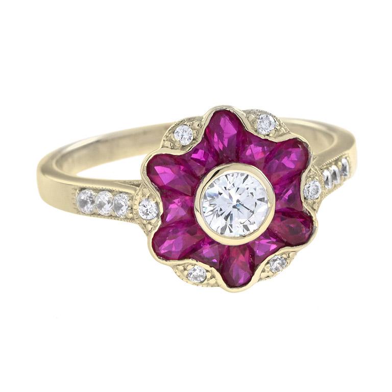 With a gorgeous design that includes a diamond center and ruby petals of morning glory flower design, this antique-style ring will make you beam with happiness. 14K Yellow Gold. 
Ring Information
Style: Art Deco
Weight: 4.00 g. (approx. total