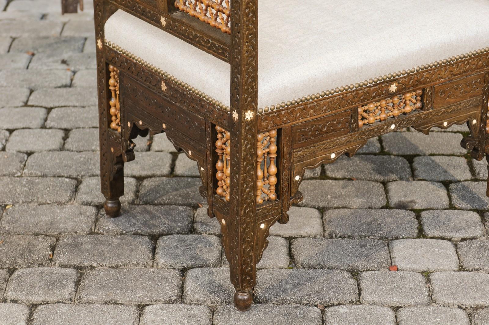 Moroccan 1900s Carved Two-Toned Wooden Upholstered Bench with Out-Scrolling Arms In Good Condition In Atlanta, GA