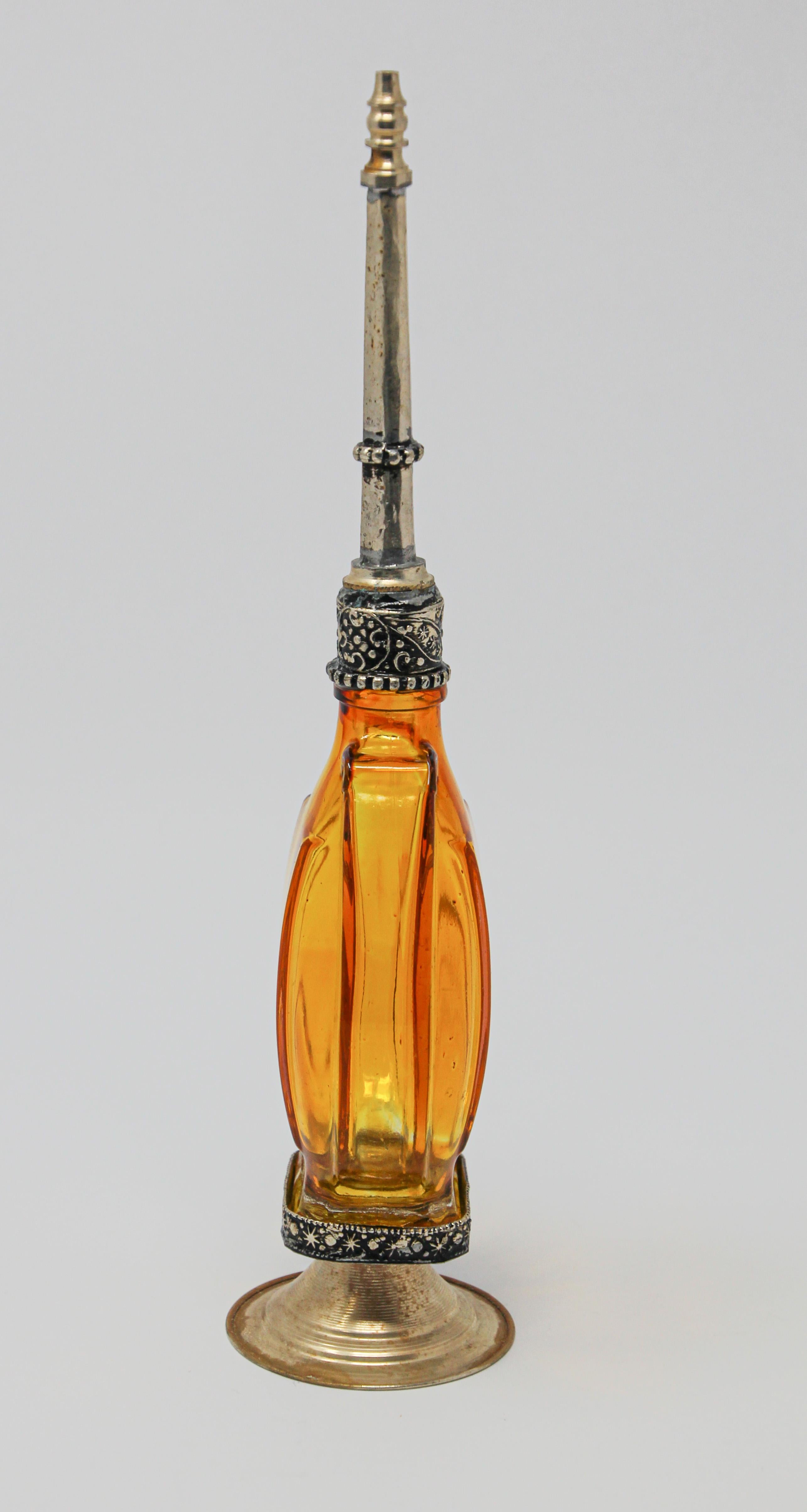 Moorish Moroccan Amber Footed Glass Perfume Bottle Sprinkler with Embossed Metal Overlay For Sale