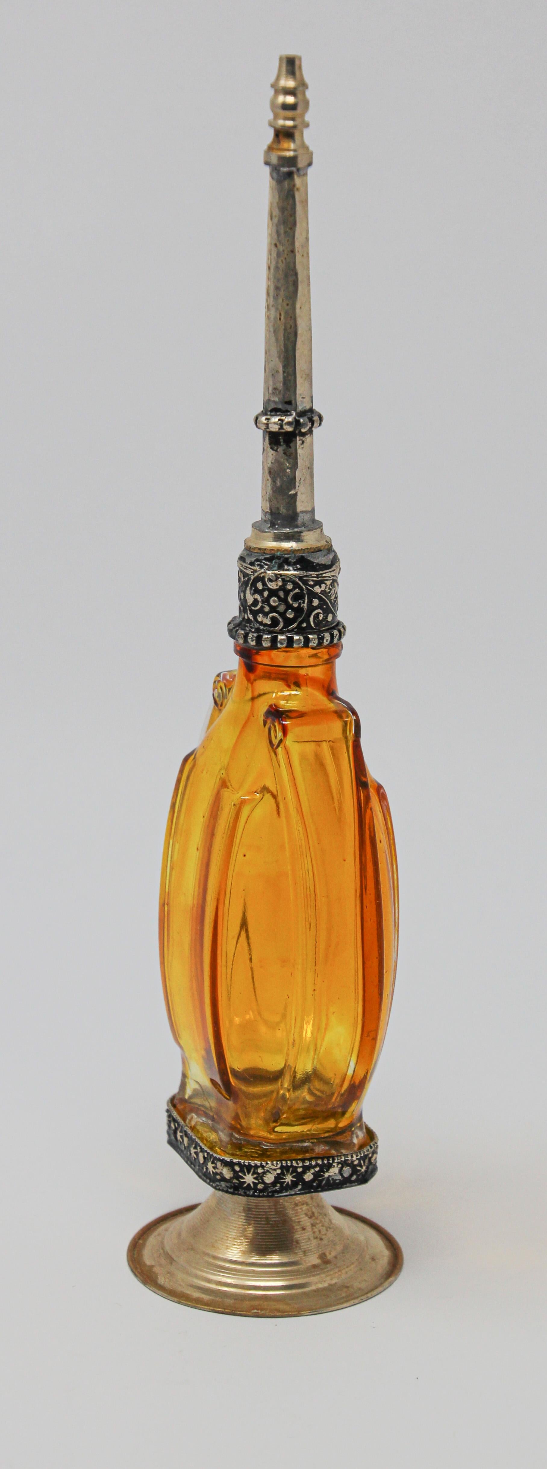 Hand-Crafted Moroccan Amber Footed Glass Perfume Bottle Sprinkler with Embossed Metal Overlay For Sale
