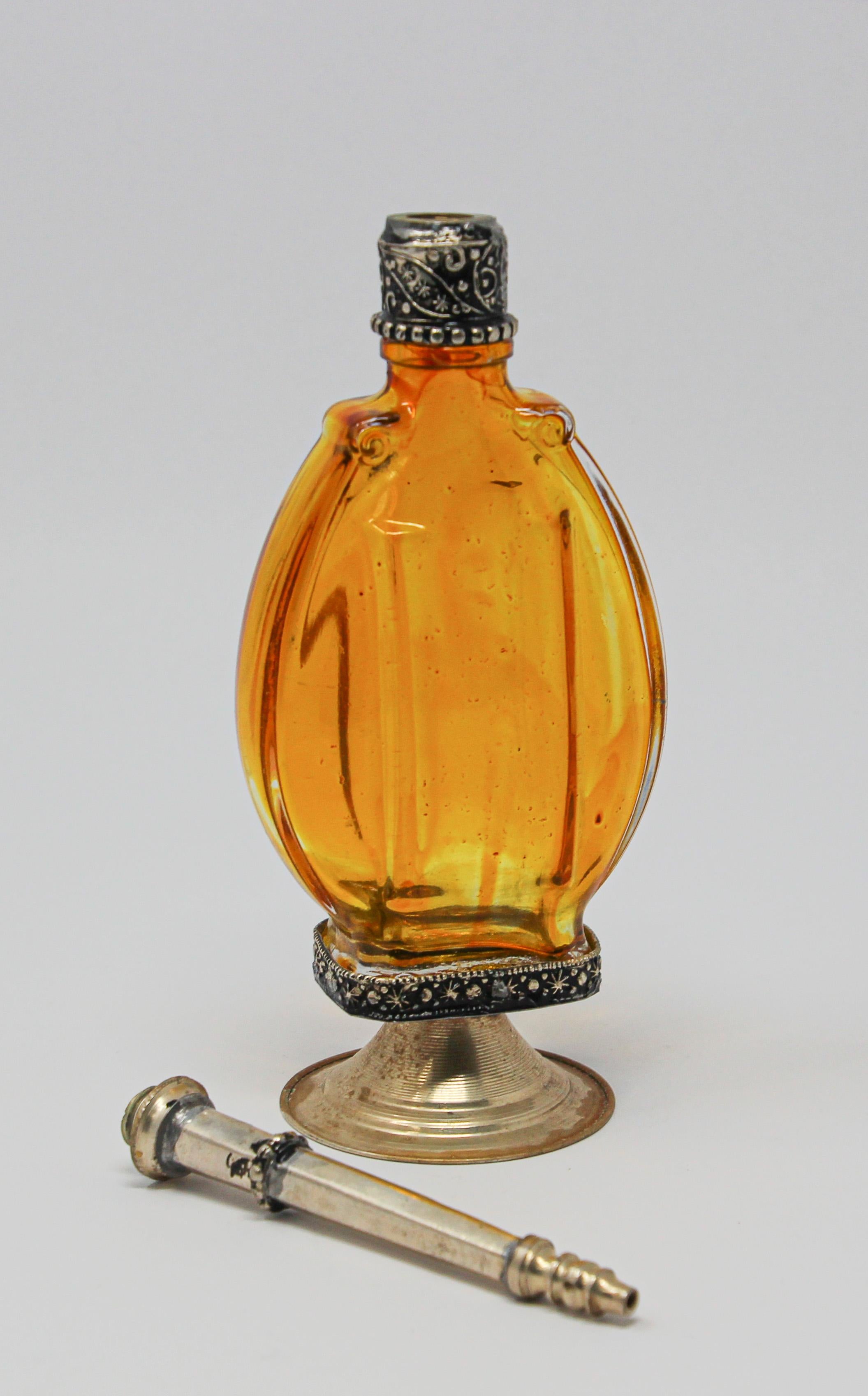 Moroccan Amber Footed Glass Perfume Bottle Sprinkler with Embossed Metal Overlay In Good Condition For Sale In North Hollywood, CA