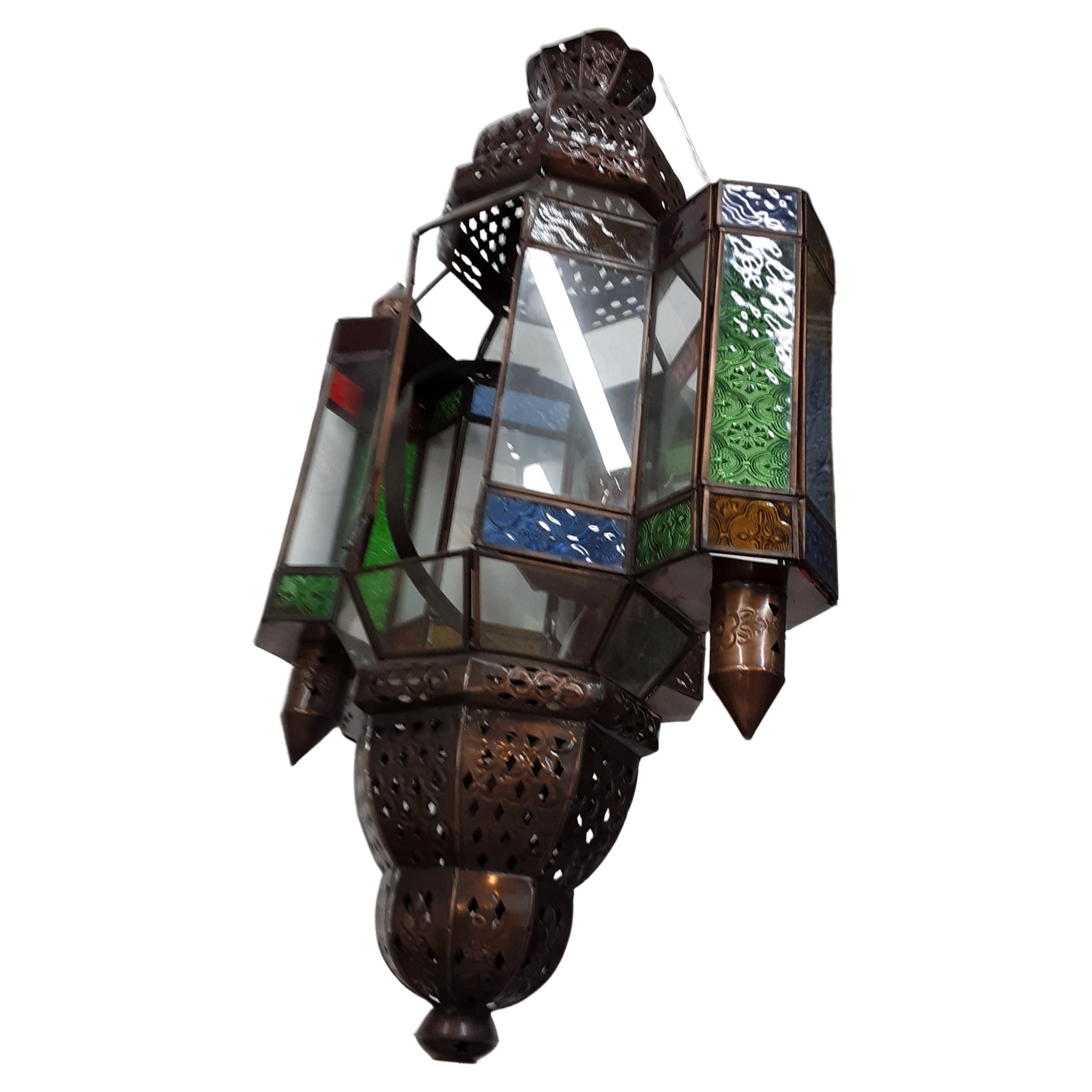 This is a vintage Moroccan art glass lamp set, the way it used to be made. The lamps were retrofitted with electric wiring. This is a true decorators piece.