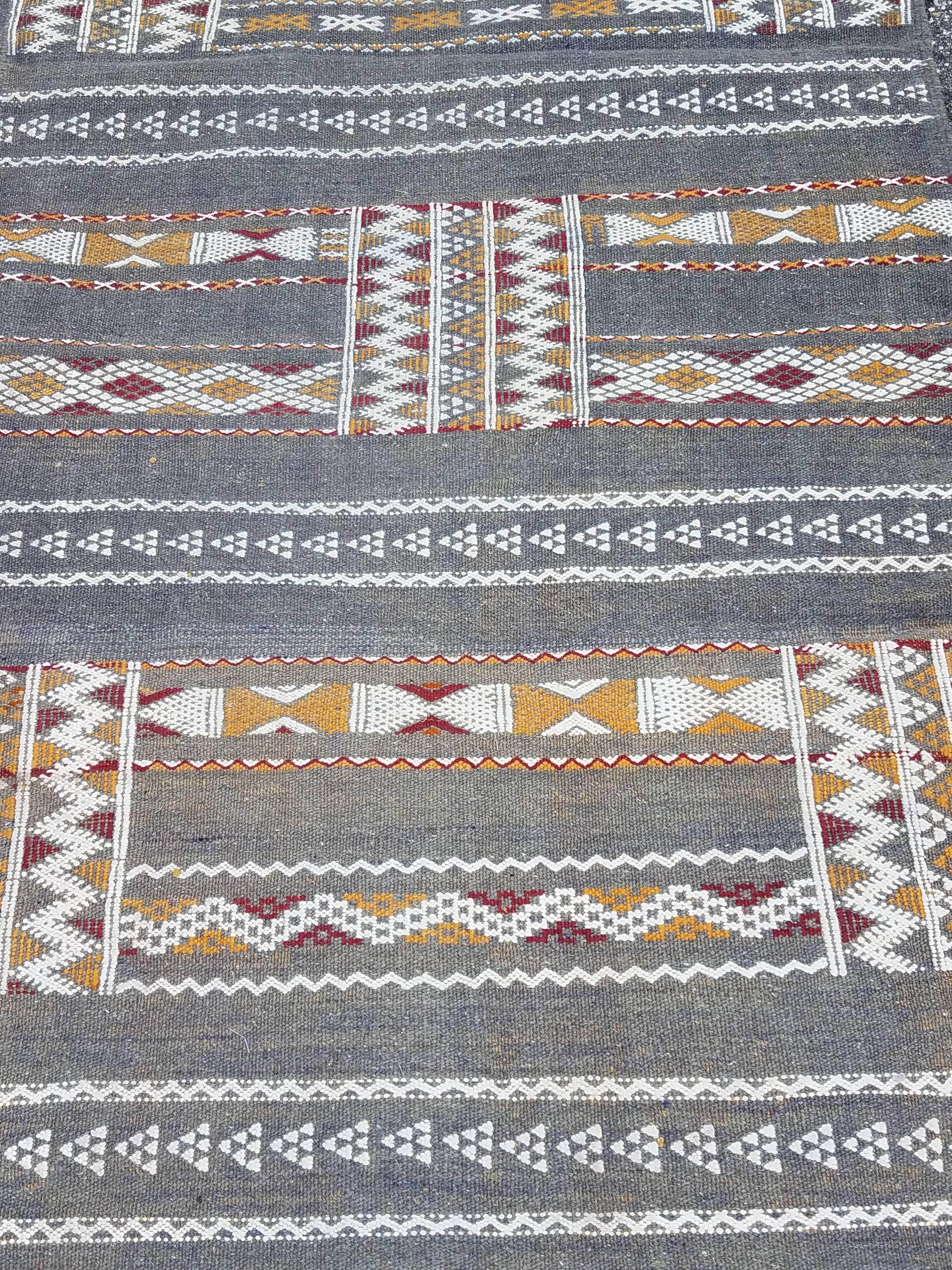 Multi-color Moroccan Berber runner / rug. Excellent handcraftsmanship. Priced to sell. Measuring approximately 93 inches long and 32 inches wide, this amazing rug comes from the Atlas mountains of Morocco. It would be a great addition to your home