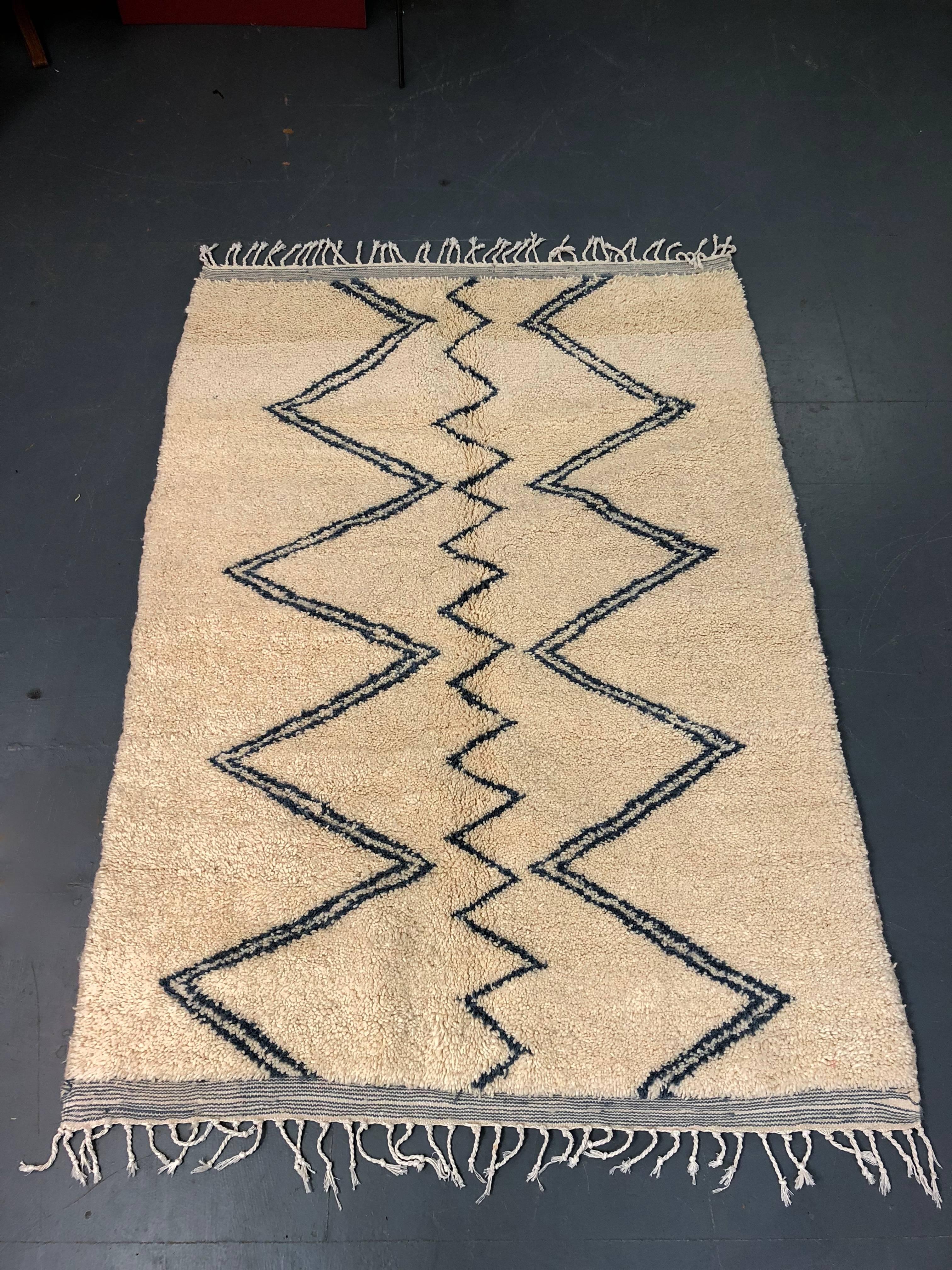 Beautiful Azilal rug from Morocco. Handcrafted from wool and cotton, no two of these are the same. Sourced from the villages of the Atlas Mountains, these rugs are vibrant and creative, an expression of modernism in folk art. They set off vintage