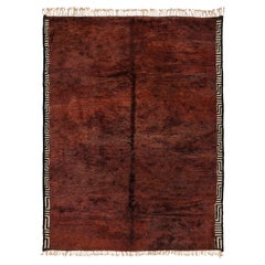 Tappeto marocchino Beni Mrirt - Lana color terracotta con motivo tribale sul bordo