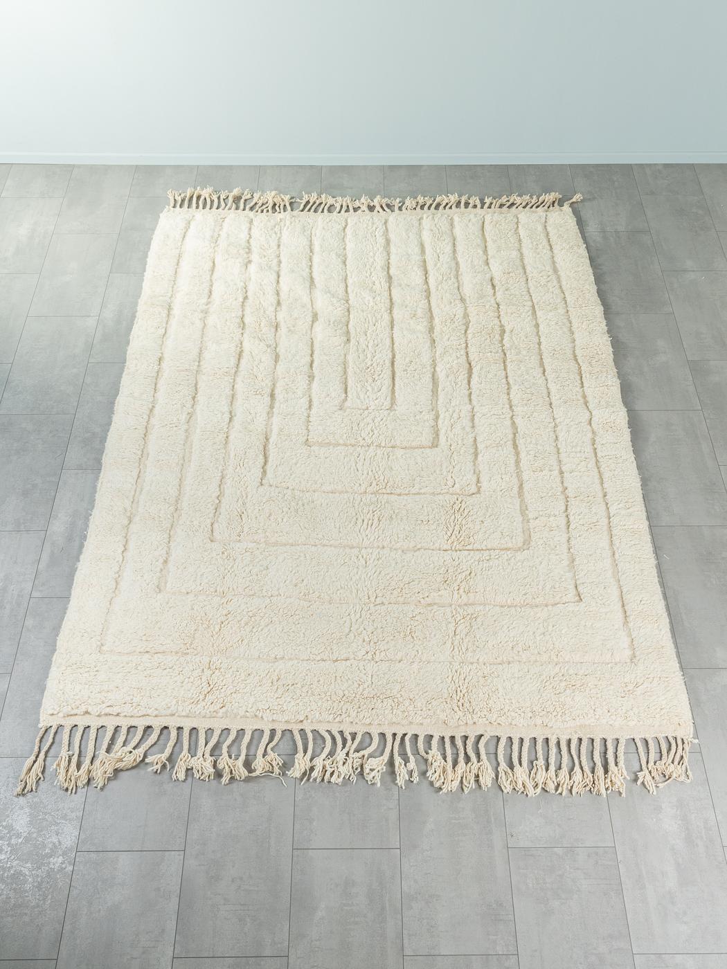 Mountains II is a contemporary 100% wool rug – thick and soft, comfortable underfoot. Our Berber rugs are handwoven and handknotted by Amazigh women in the Atlas Mountains. These communities have been crafting rugs for thousands of years. One knot