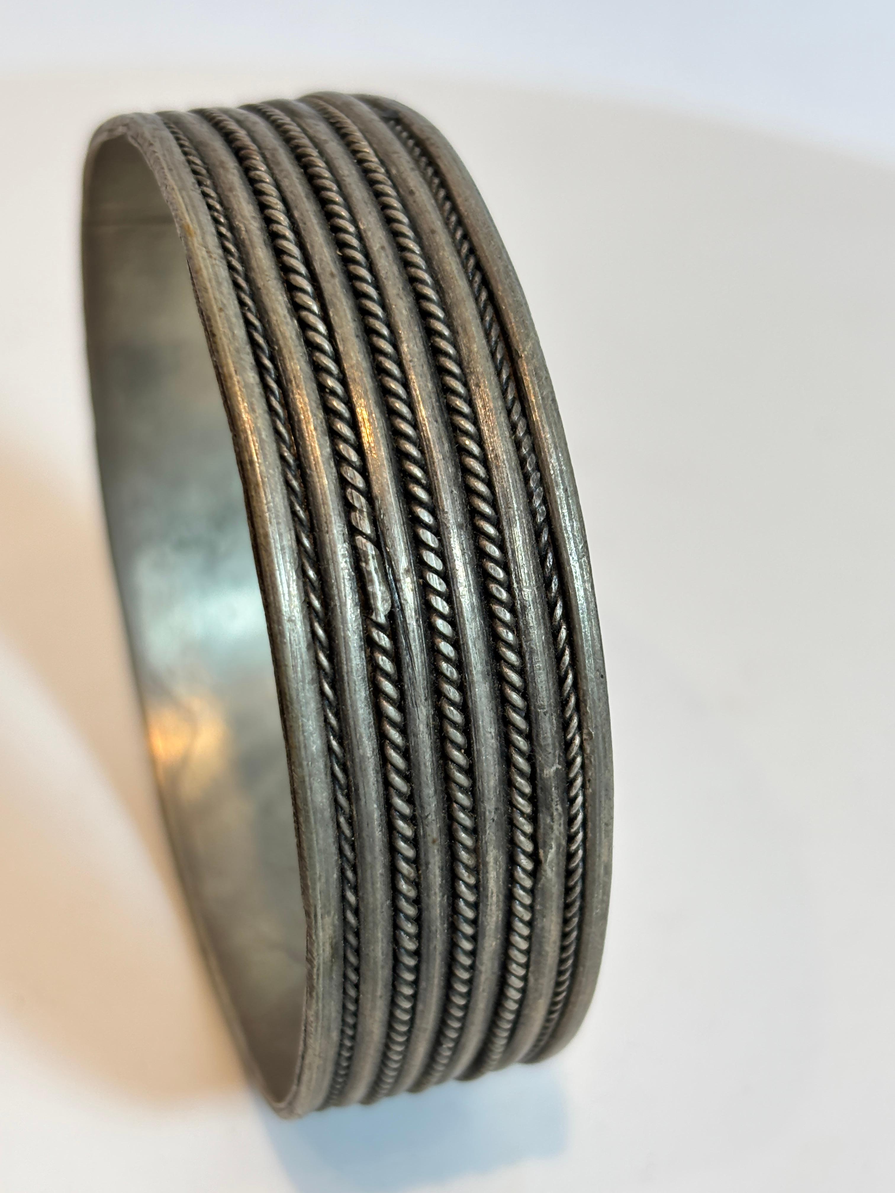 Moroccan Berber Coin Silver Ethnic Bracelet.
Moroccan Berber bracelet. 
Moroccan bracelet from the High Atlas of Morocco.
Handcrafted by Berber women using Moroccan coin silver nickel.
The ethnic Nomadic and Bedouin jewelry from the Maghreb and