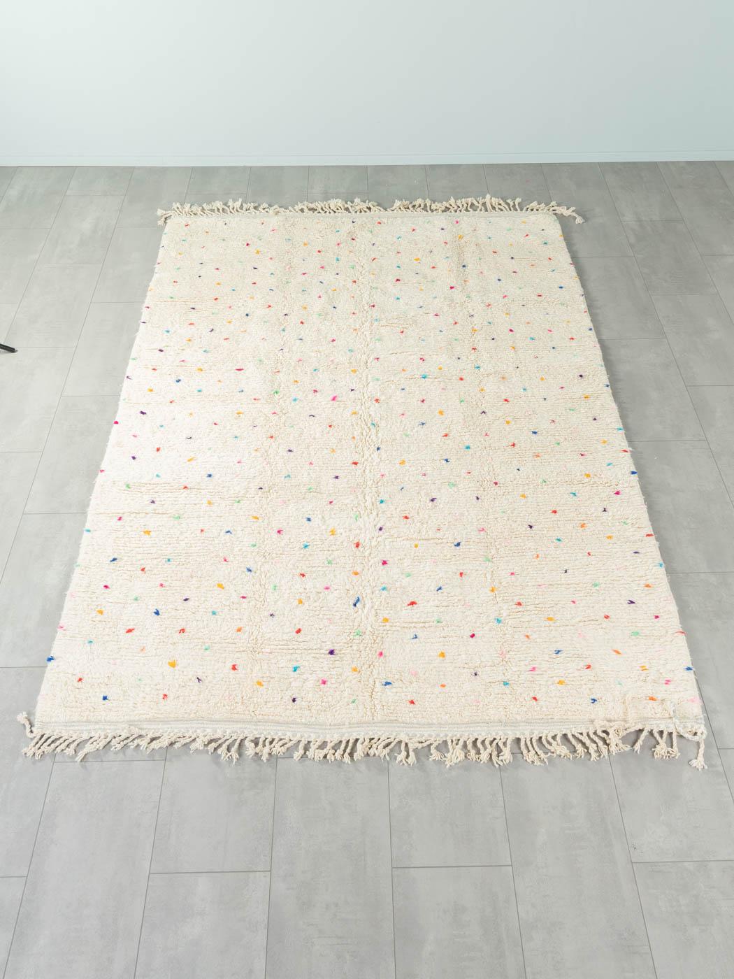 Polka Dots is a contemporary 100% wool rug – thick and soft, comfortable underfoot. Our Berber rugs are handwoven and handknotted by Amazigh women in the Atlas Mountains. These communities have been crafting rugs for thousands of years. One knot at