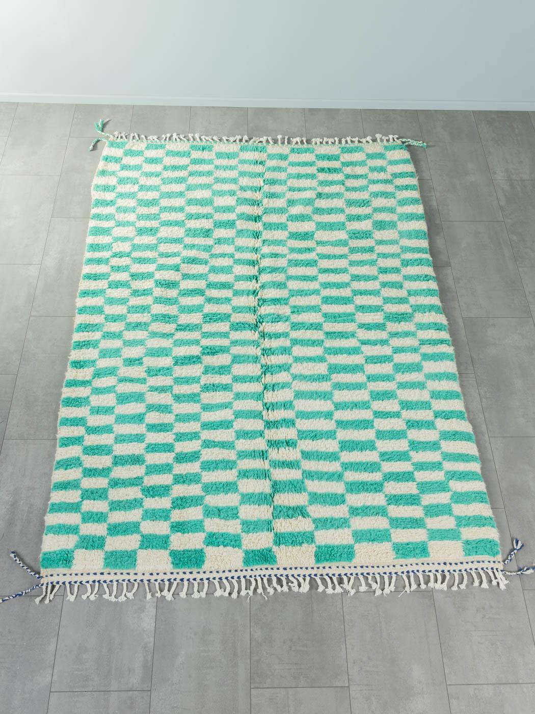 Peppermint check is a contemporary 100% wool rug – thick and soft, comfortable underfoot. Our Berber rugs are handwoven and handknotted by Amazigh women in the Atlas Mountains. These communities have been crafting rugs for thousands of years. One