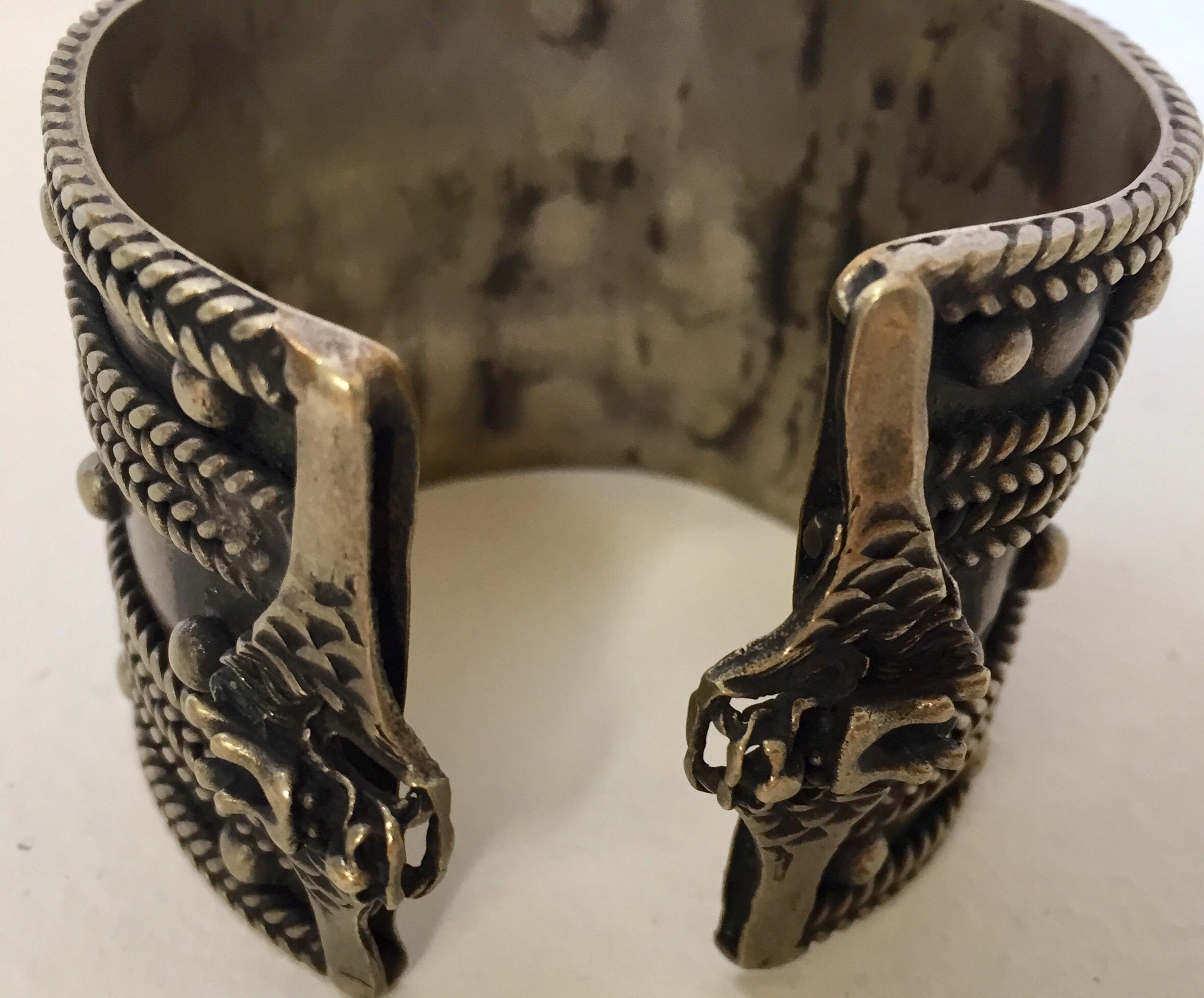 Vintage Moroccan Berber tribal bracelet from the High Atlas of Morocco. 
Handcrafted by Berber women using Moroccan silver nickel. 
The ethnic Nomadic and Bedouin jewelry from the Maghreb and North Africa is usually made of german silver and the
