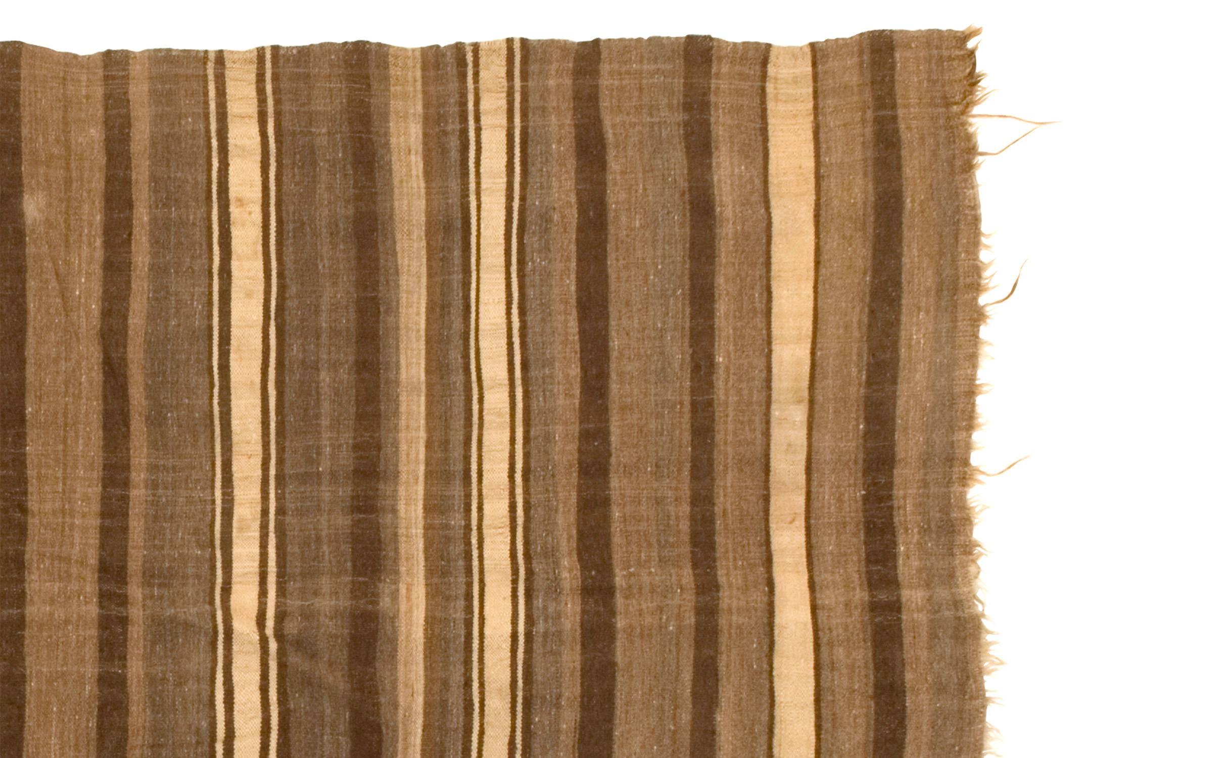 • One of a kind flat-weave blanket
• 100% lightweight wool
• Measures: 7'4