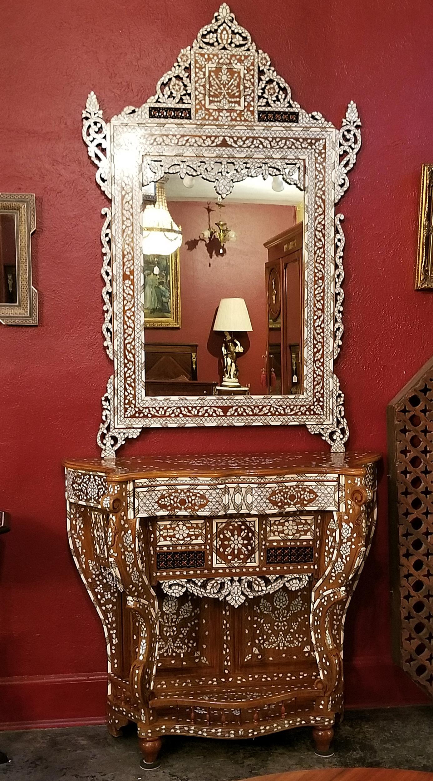 Presenting a stunning 20th century Moroccan bone and mother of pearl inlaid console table and mirror.

It is difficult to find these tables on their own … but with the matching mirror it is exceptional.

Made in Morocco circa 1960 it is in near