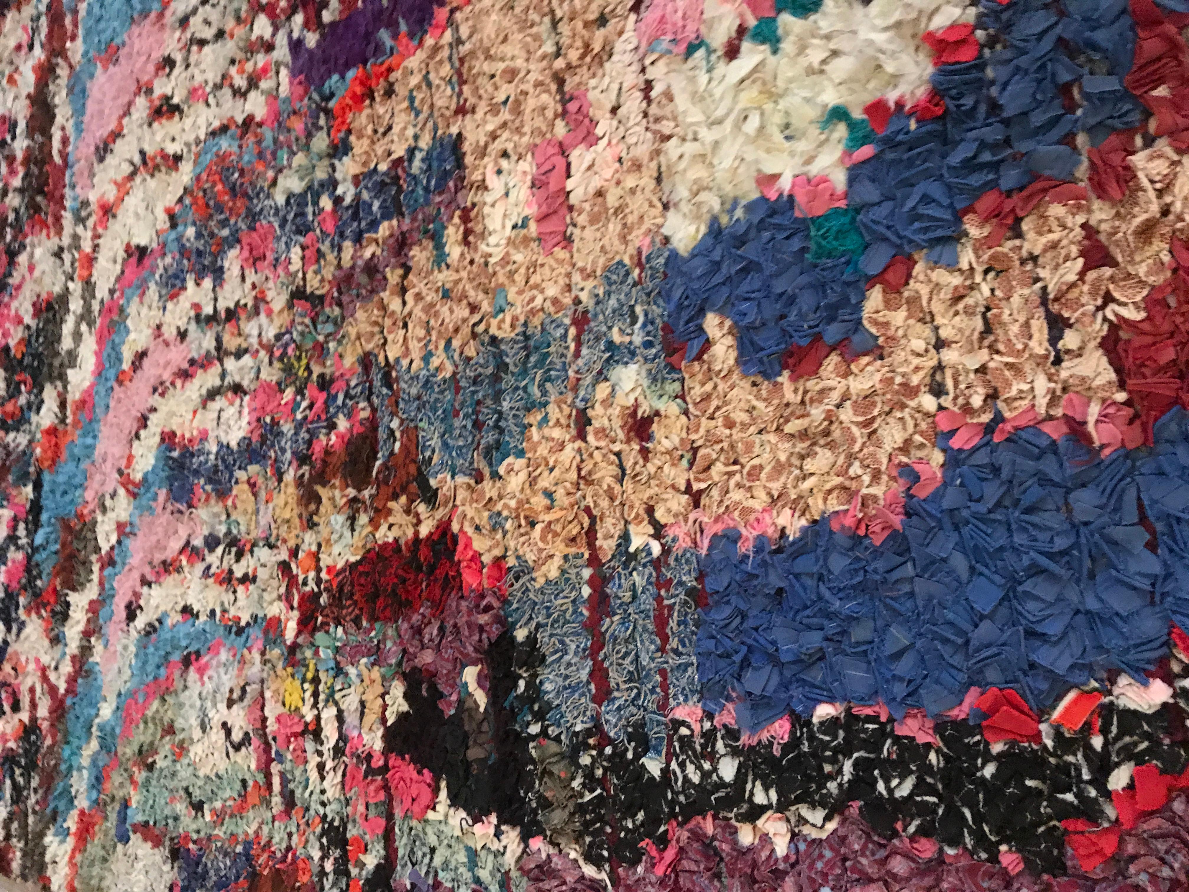 Beautiful Boucherouite rag rug in a multicolored pattern.