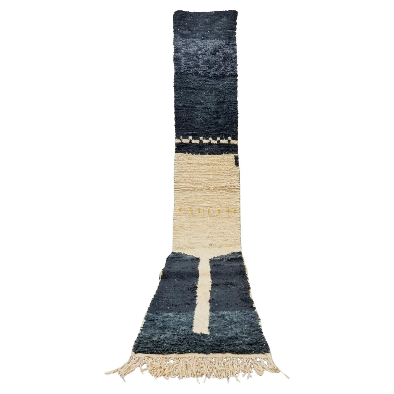 Tapis marocain Boujaad à motifs géométriques noirs et beiges