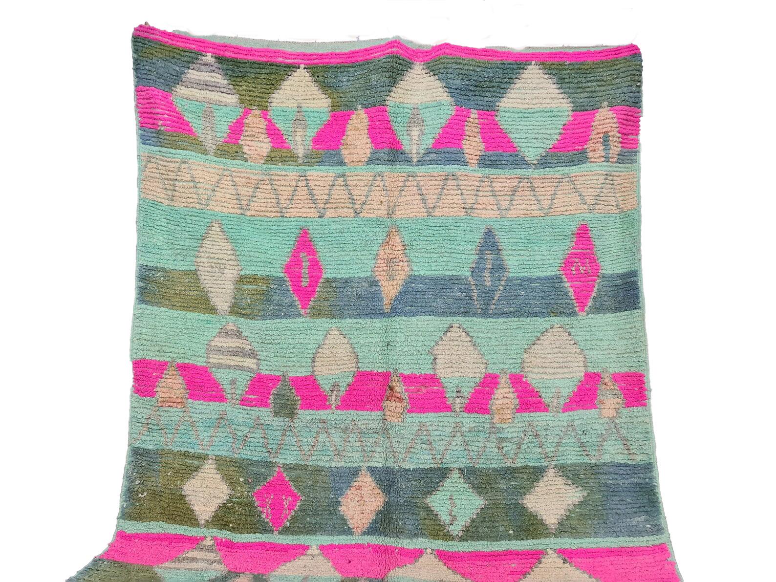 Moroccan Boujaad rug handwoven out of natural and soft sheep wool featuring geometric patterns.

Width: 6 ft
Length: 10.5 ft