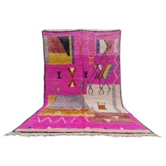 Tapis marocain Boujaad rose avec motifs géométriques