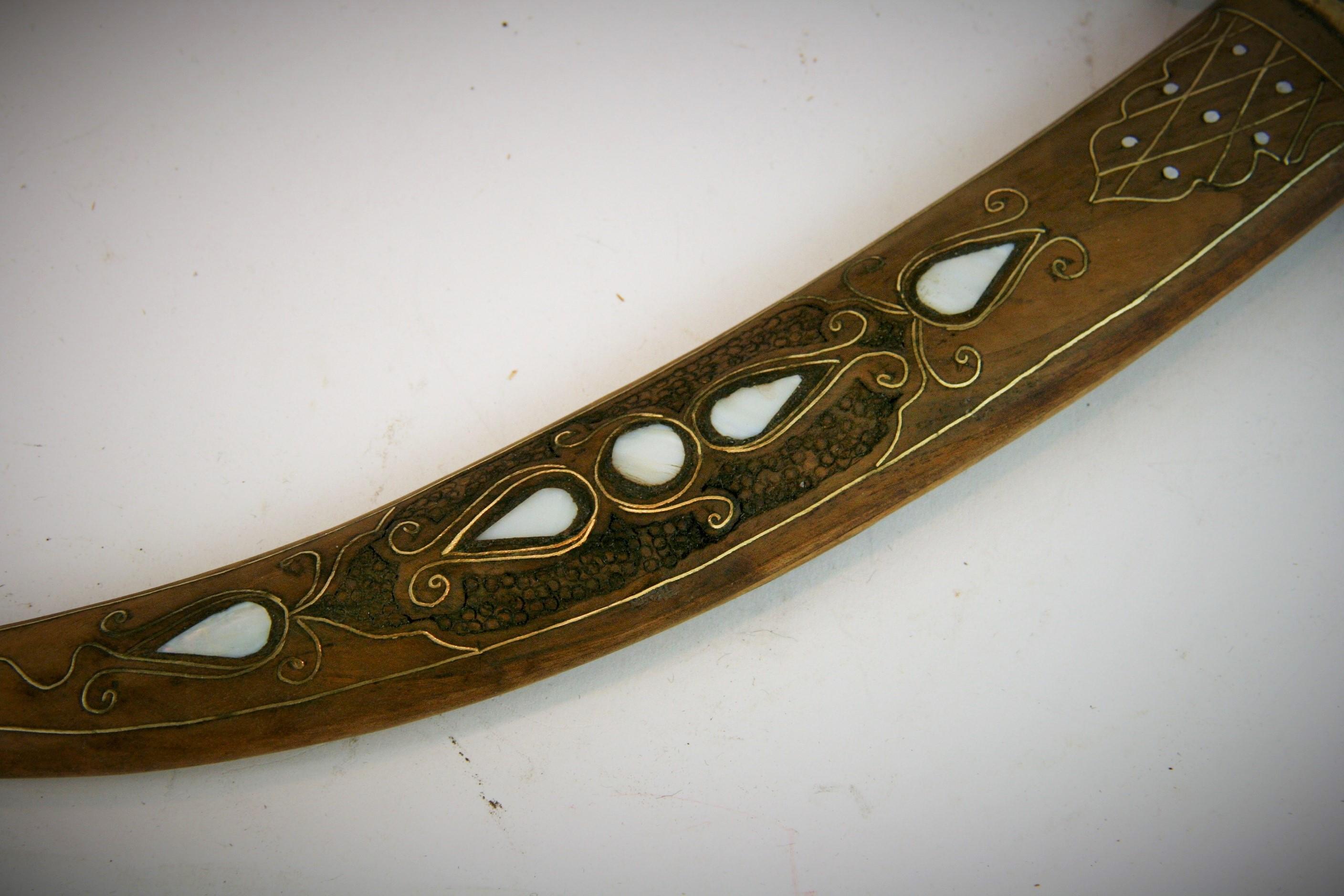 3-452 Moroccan brass and mother of pearl inlayed wood dagger.