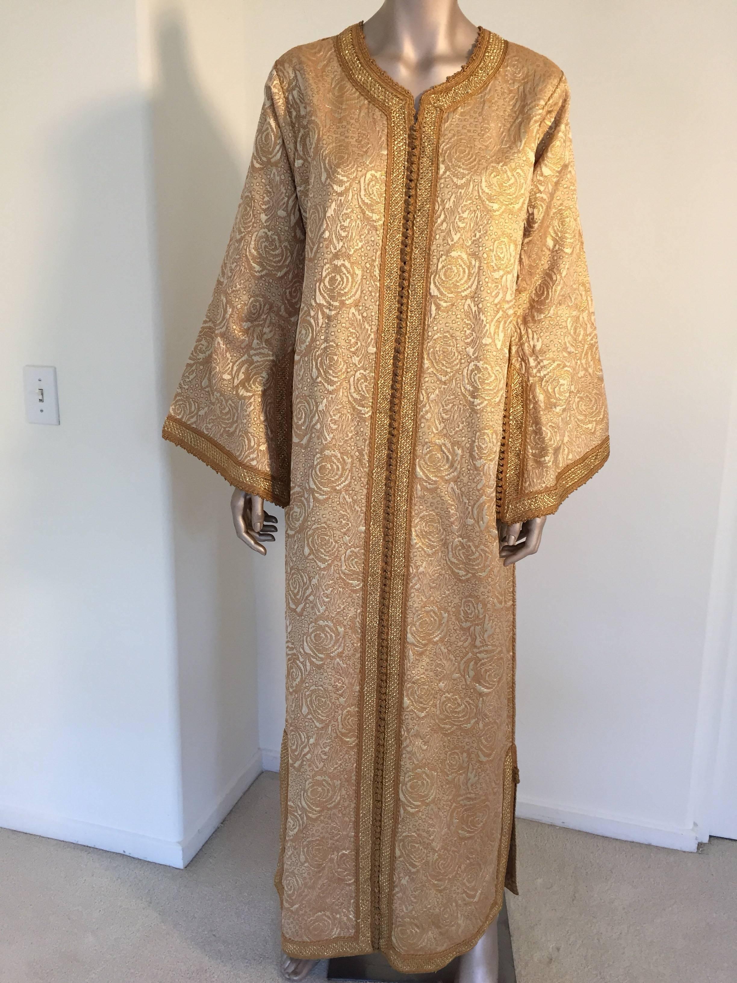 Moroccan evening or interior bronze gold metallic floral brocade dress kaftan with gold trim.
Handmade ceremonial caftan from North Africa, Morocco.
Vintage exotic 1970s metallic purple brocade caftan gown.
The luminous bronze, cream and gold