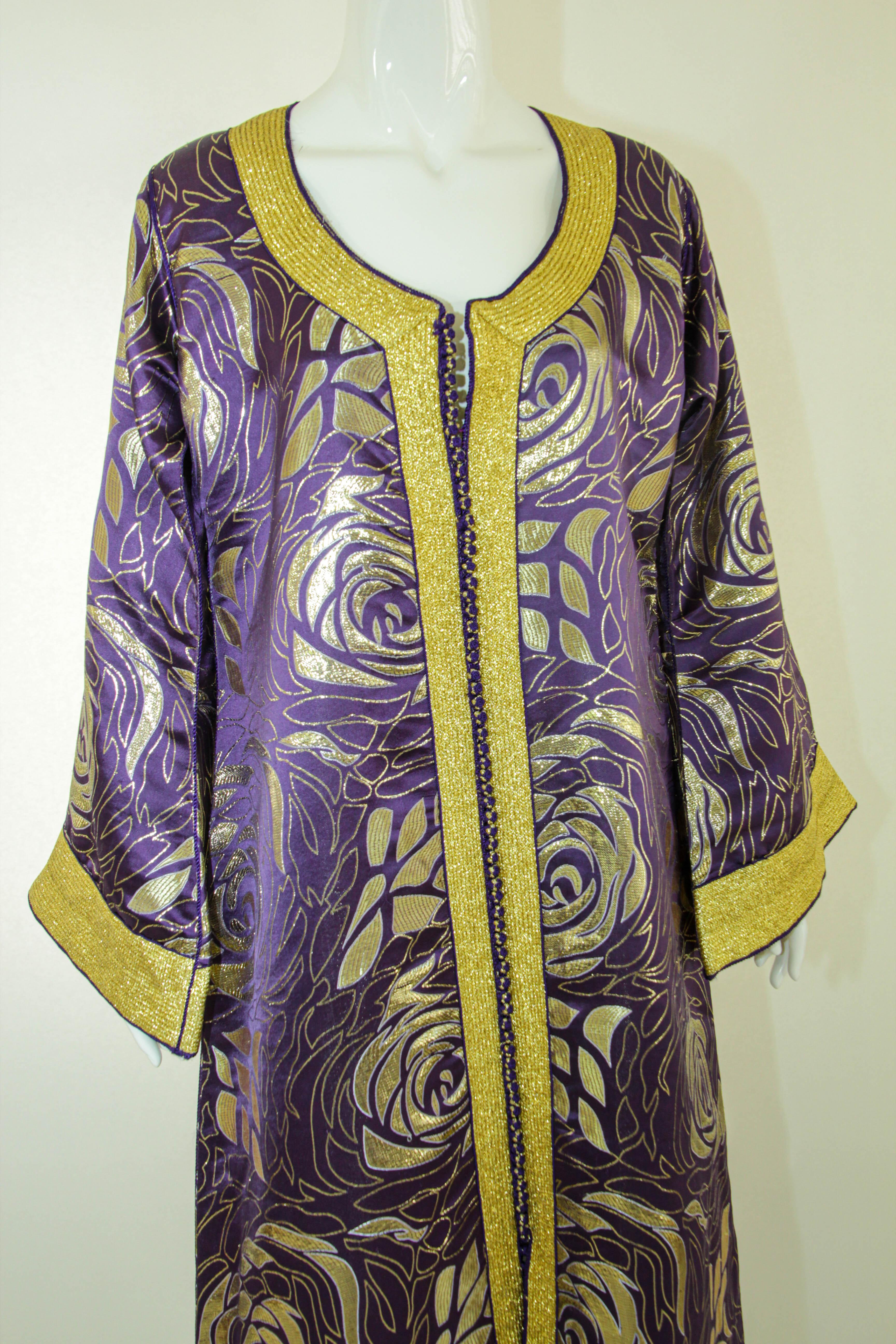 Gorgeous vintage Moroccan Caftan, gold silk damask purple violet with gold threads trim, Circa 1960's
The gold and purple with gold bold floral damask kaftan was custom fit.
Feel like a queen in this elegant, sumptuous, Moroccan caftan with its bold