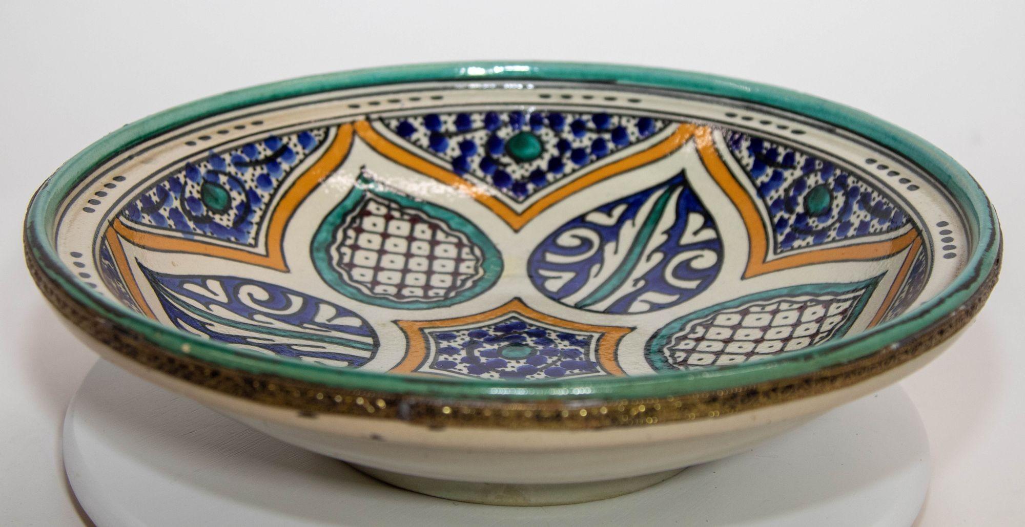 Antique Hand-Painted and Handcrafted Moroccan Ceramic Bowl or Wall Art Decorative Plate,
Large Moroccan ceramic bowl handcrafted in Fez by artisans. Hand painted Moorish ceramic plate from Fez Morocco.
Hand-painted with natural minerals by artisans