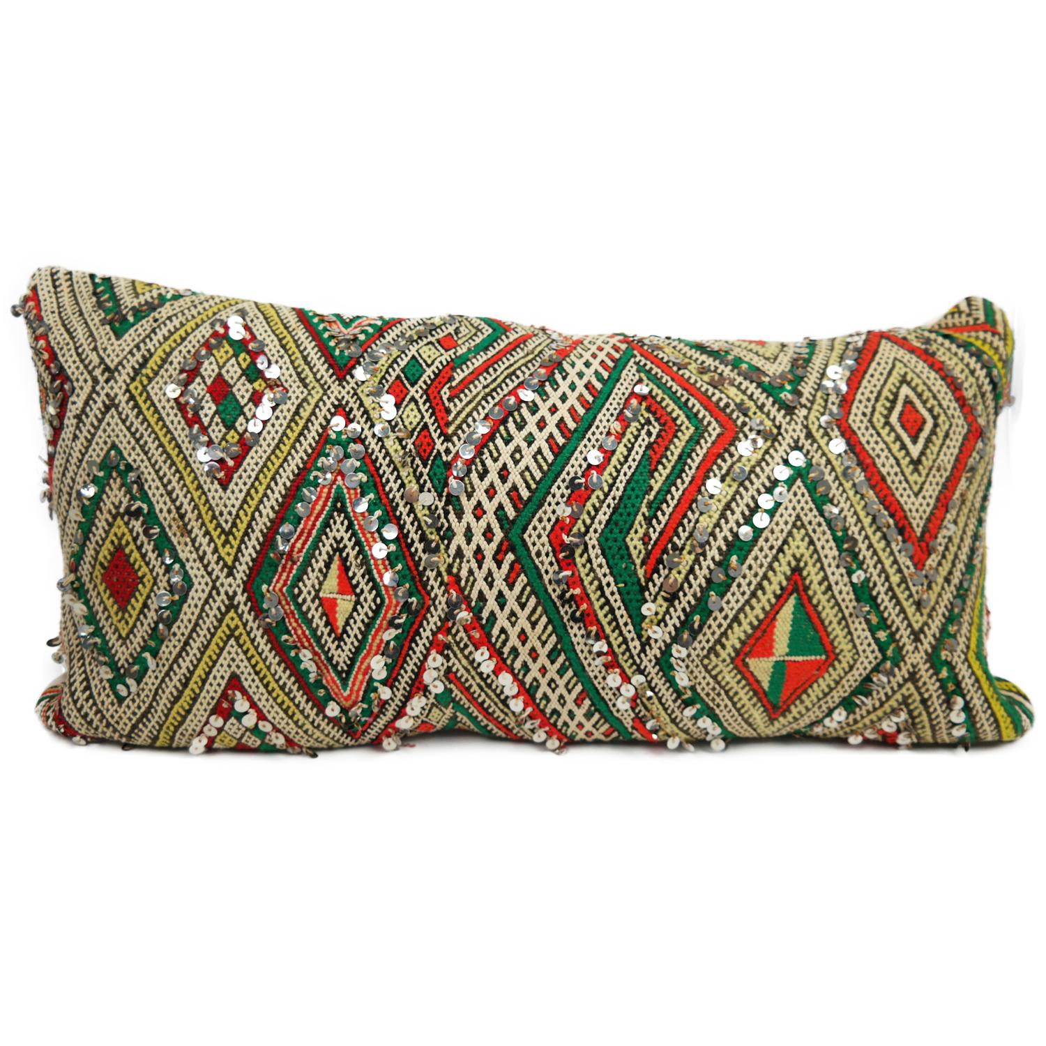 A stunning extra large Bohemian Moroccan Kilim cushion custom made in Morocco. Cut from a circa 40 years old hand loomed kilim rug, from the Middle Atlas Mountains. We have searched and selected the rug ourselves. The pillow has beautiful colors