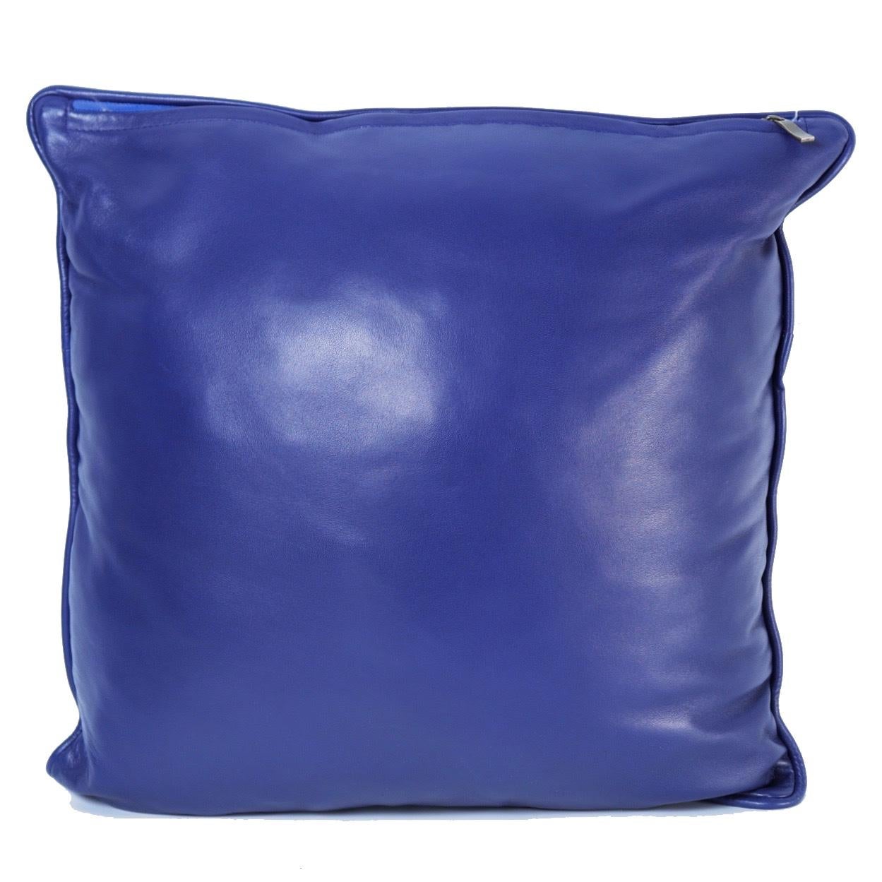Moroccan embroidered leather pillow, uniquely designed for the Jardin Majorelle in Marrakech, replicating the intense Majorelle blue that has made the garden famous, using Moroccan craftsmen to replicate the unusual tri-arrow interlocking pattern