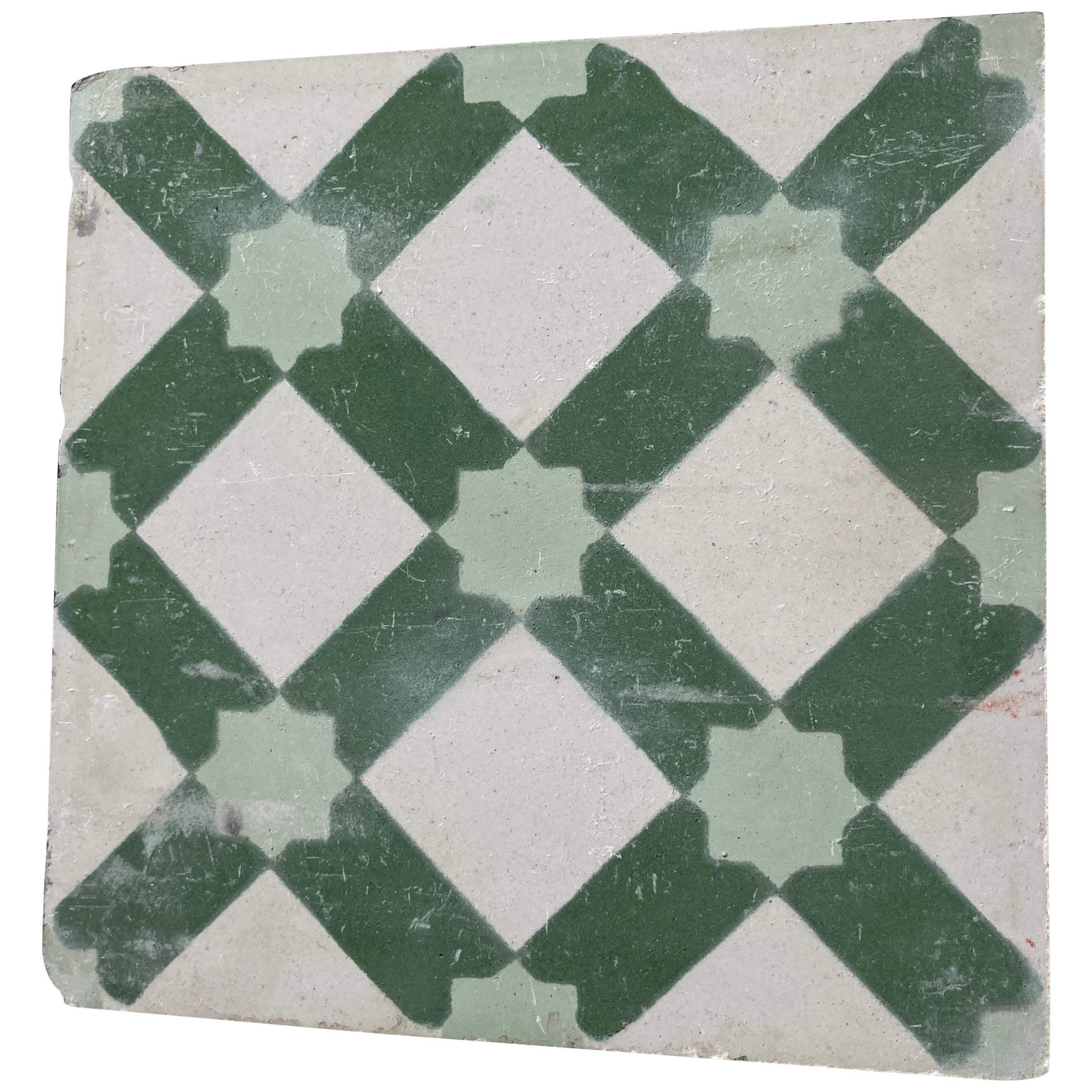 Set of four Moroccan handcrafted cement tile with traditional Green Moorish design. 
These are authentic Moroccan encaustic tiles hand made by artisans in Fez Morocco. 
This is the traditional Moroccan star design. 
These are handmade cement