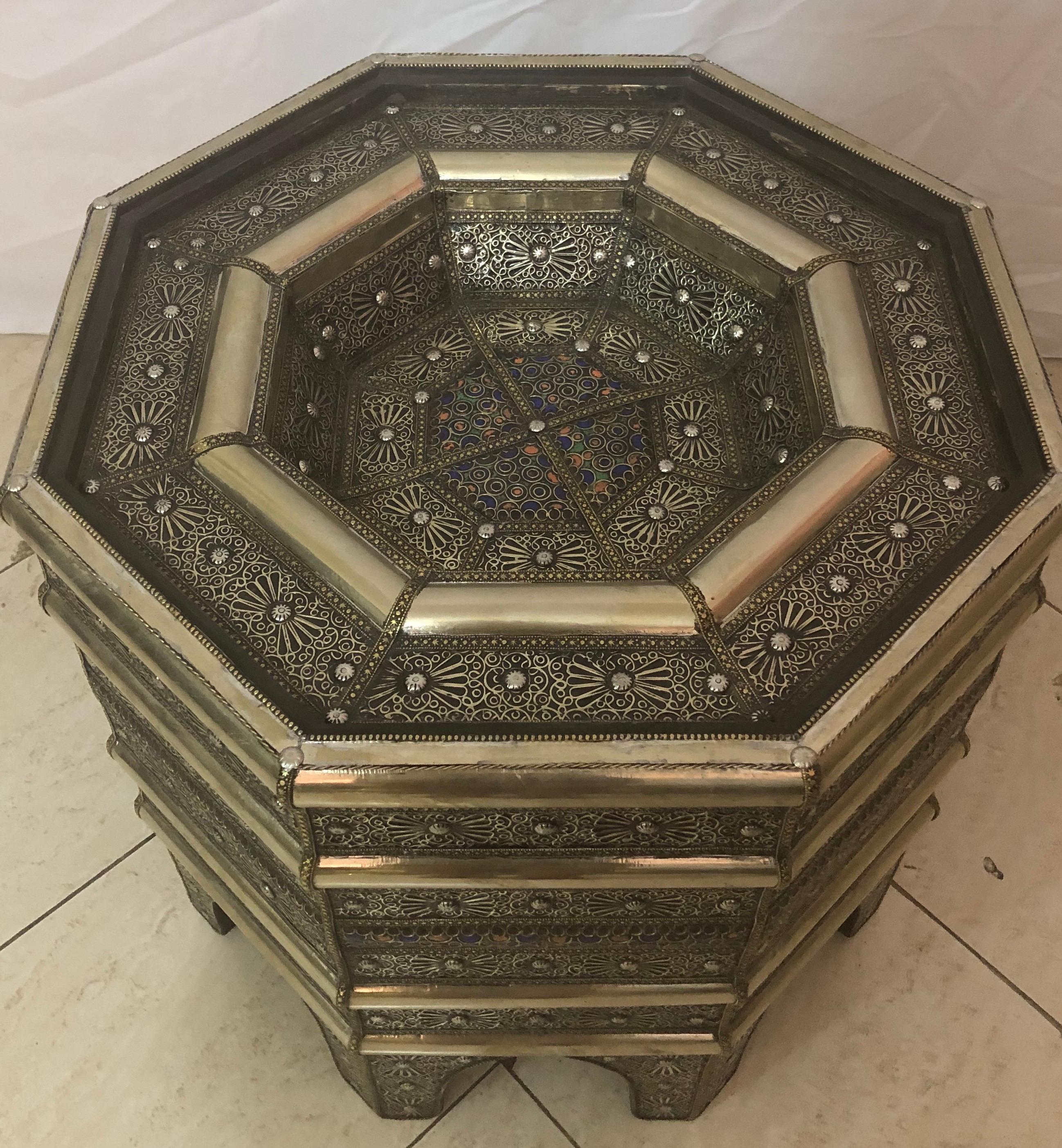 An elegant  Hollywood Regency style octagonal center or side table, crafted with meticulous attention to detail. Handmade with passion and precision, it boasts an intricate filigree design that epitomizes sophistication and artisanship. 
Every
