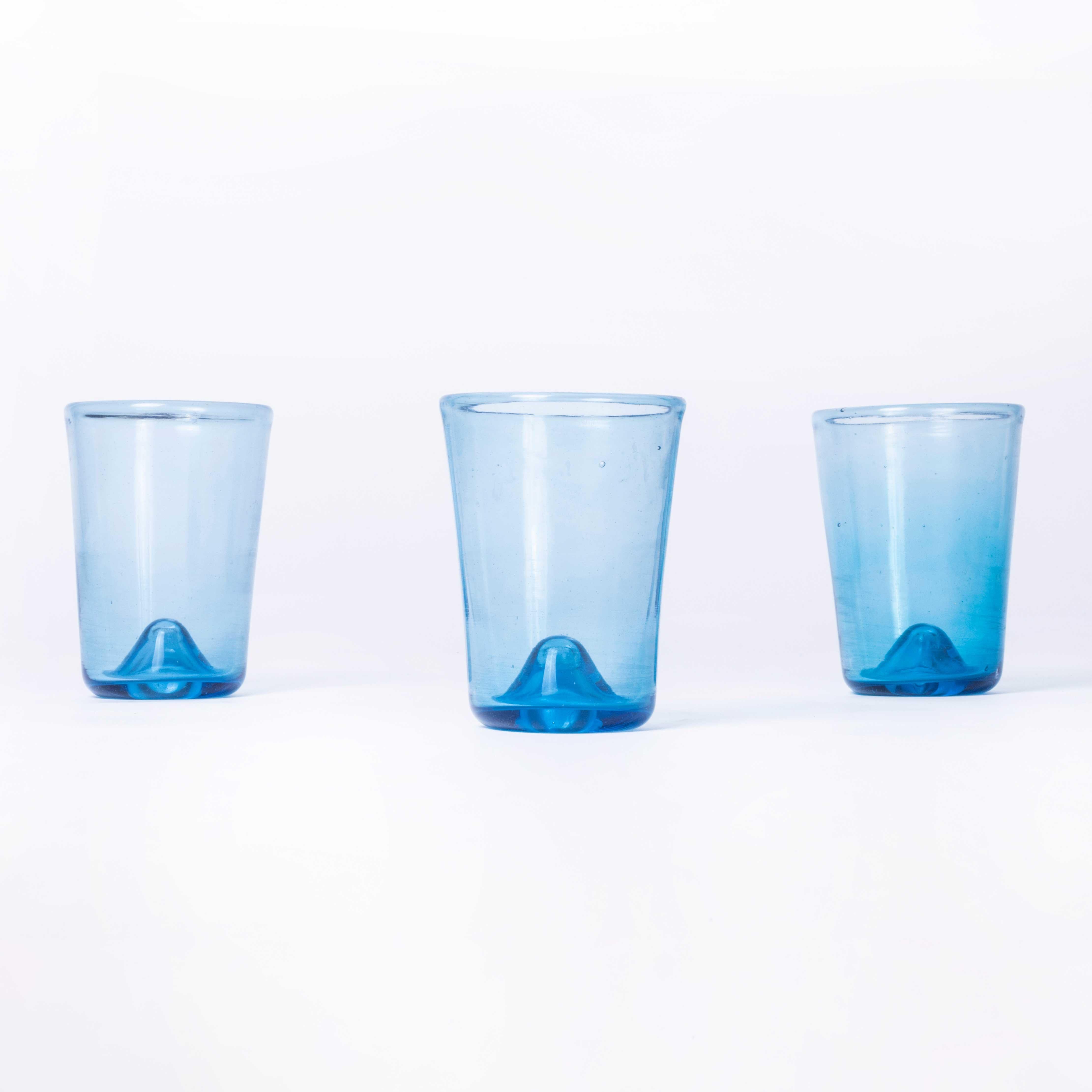 Moroccan Fine Tumblers – Blue
Moroccan Fine Tumblers – Blue. Hand-made in Morocco. The glass is mouth blown and available in a beautiful soft blue. The glass is mouth blown in a wonderful artisan quality. Because of the artisan production the