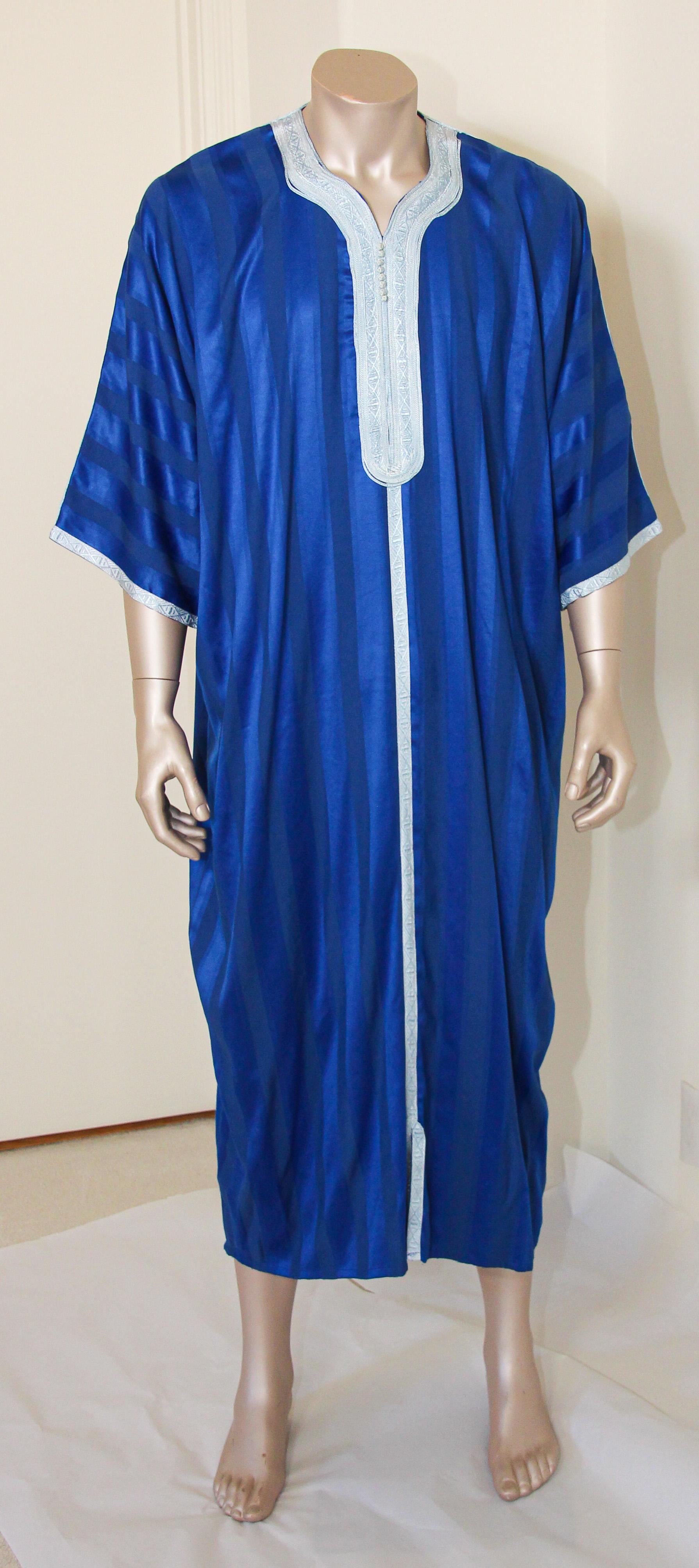 Moroccan gentleman vintage cobalt blue caftan embellished with embroidered trim.
In Morocco, fashion preserves its traditional style inherited from great civilizations that found their way to Northwest Africa, such as the Ottomans and the