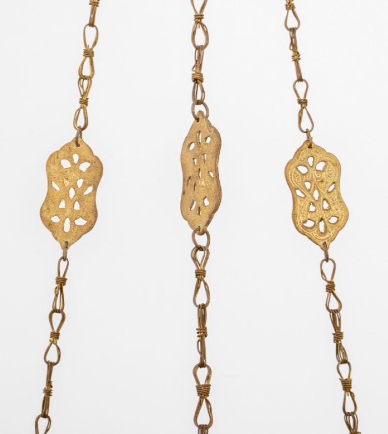 Moroccan gilt brass reticulated six-light hanging oil pendant lamp on openwork chains.

Dealer: S138XX