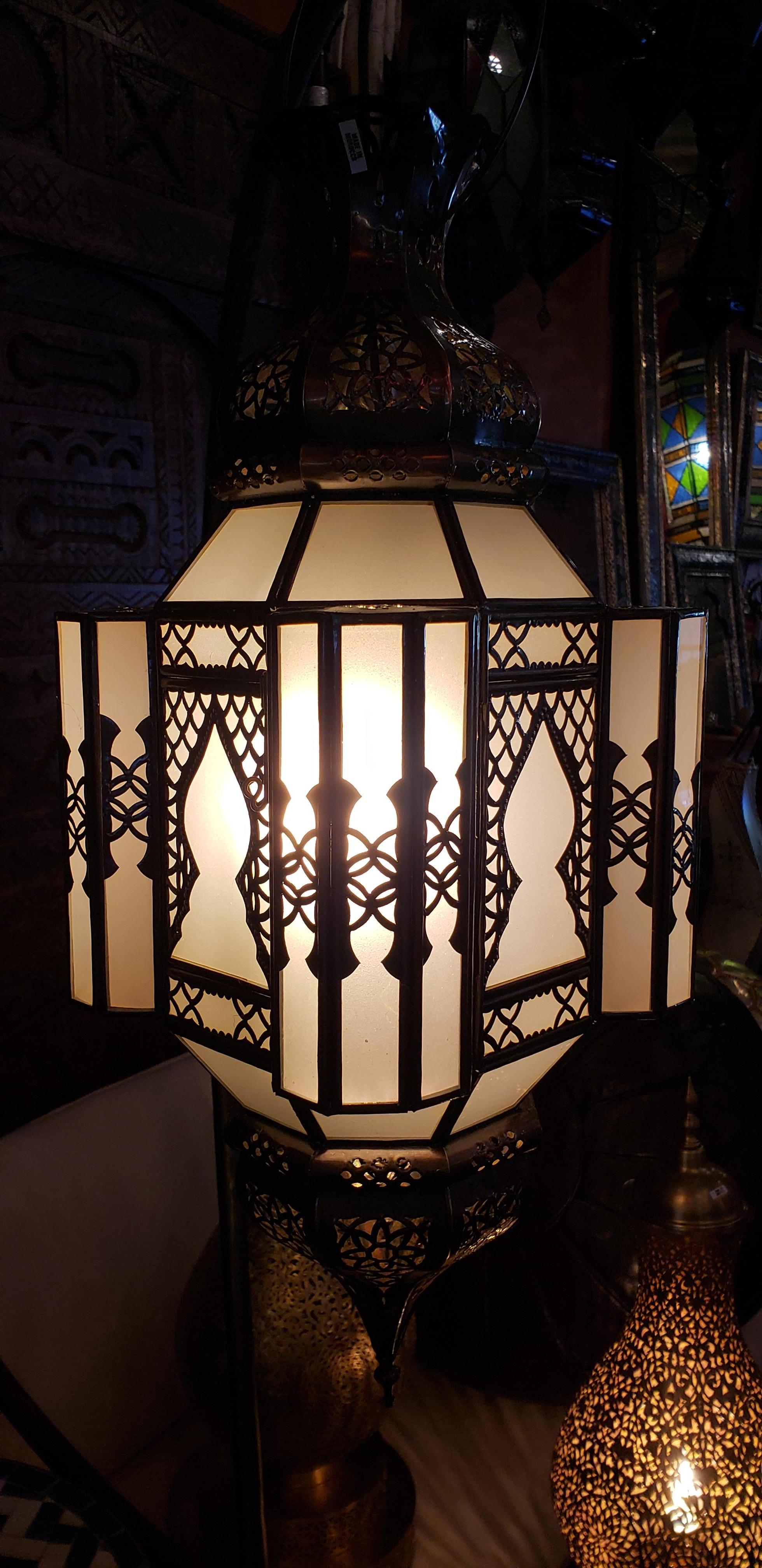 Handmade Moroccan glass lantern with frosty white stain glass and metal rustic frame, measuring around 26