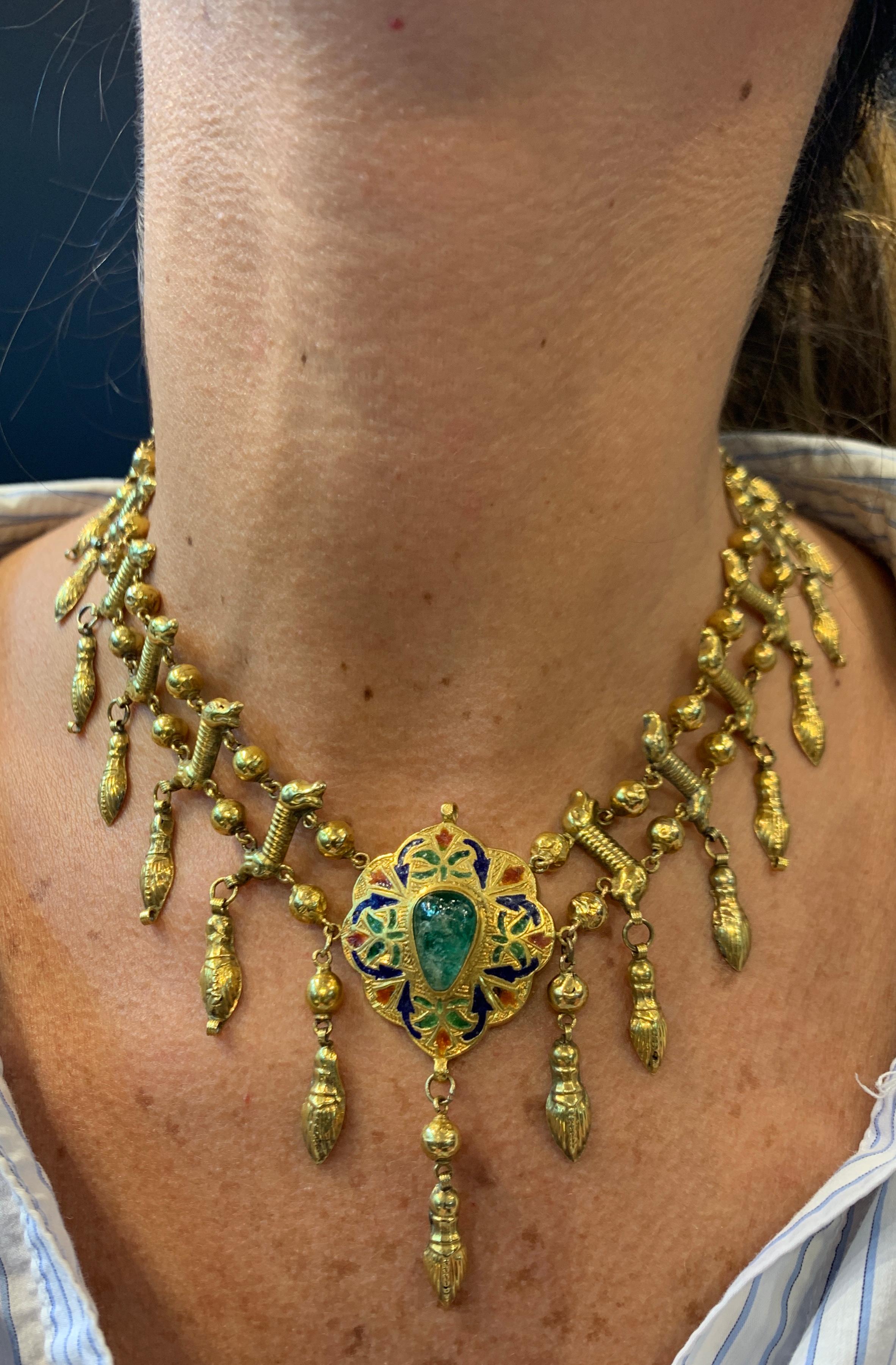 Moroccan Gold Emerald Necklace 
Center Enamel Moroccan Pendant made Circa 1850 set on a later 14k gold necklace 
Reverse set with enamel
Gold Type: 14K Yellow Gold 
Measurements: 14.5