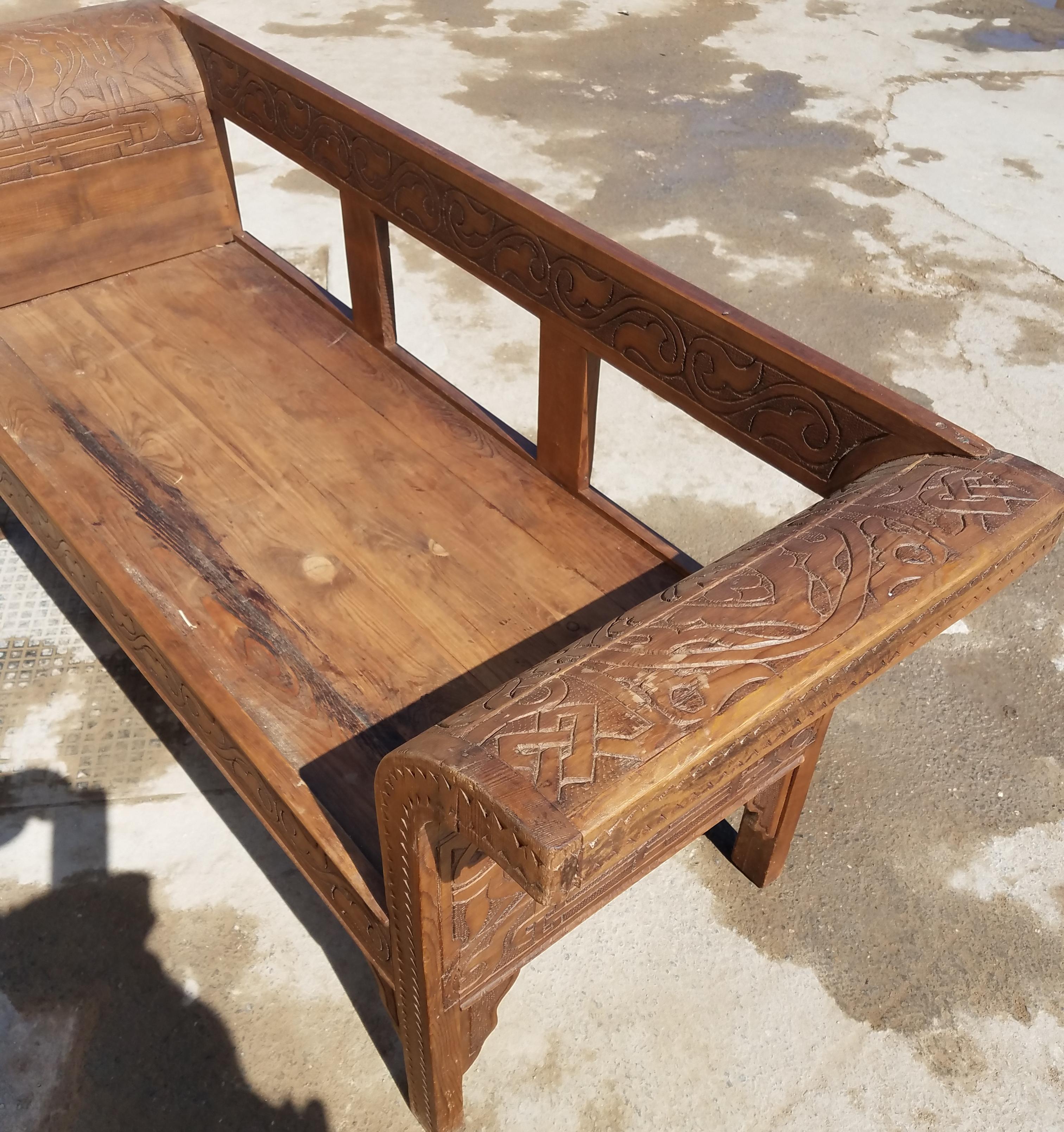hand carved wooden bench