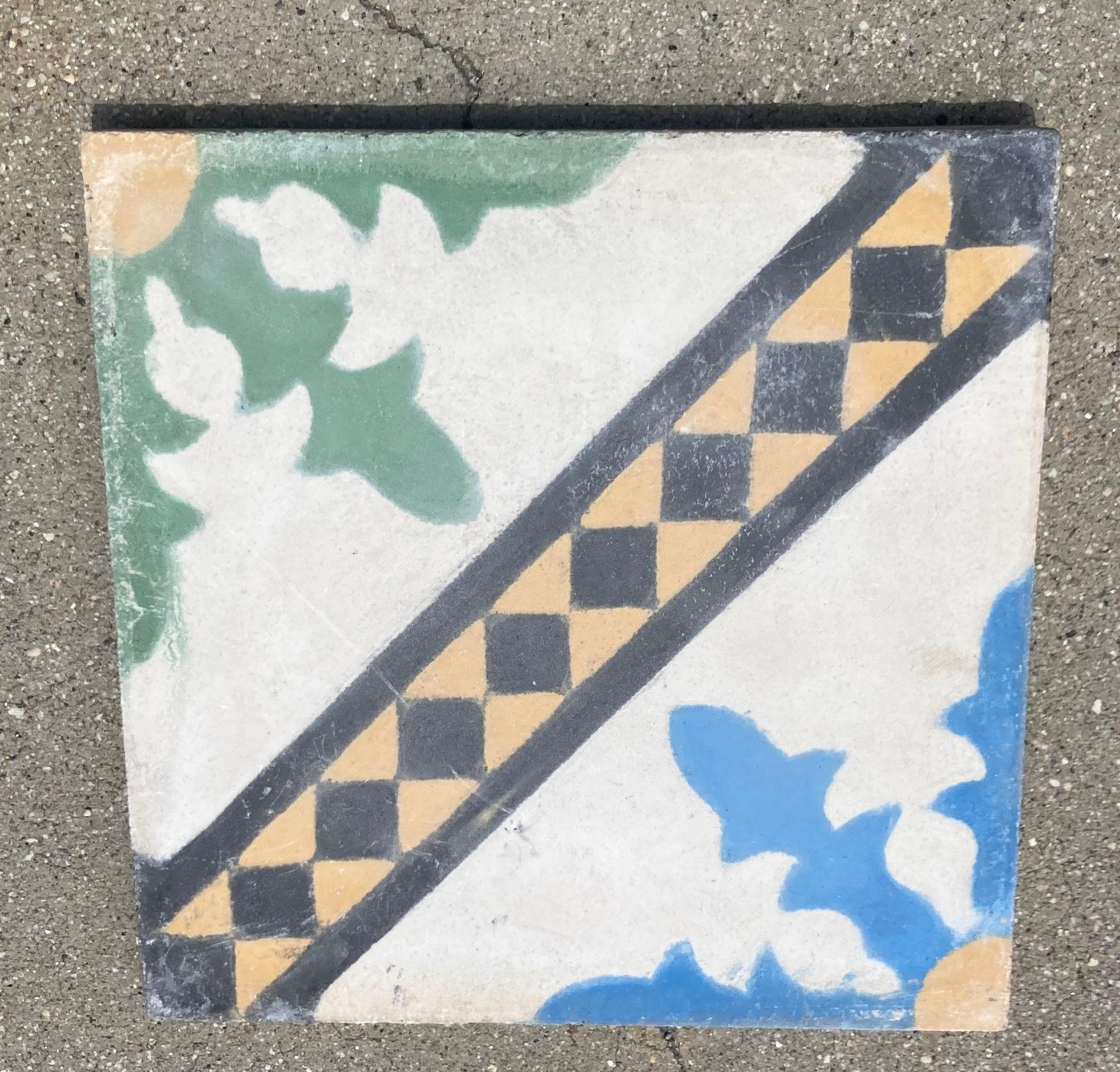 Moroccan Hand-Painted Cement Tile with Traditional Fez Design.Moroccan handcrafted and hand-painted cement tile with traditional Fez design. These are authentic Moroccan encaustic tiles hand made by artisans in Fez, Morocco. This is the traditional