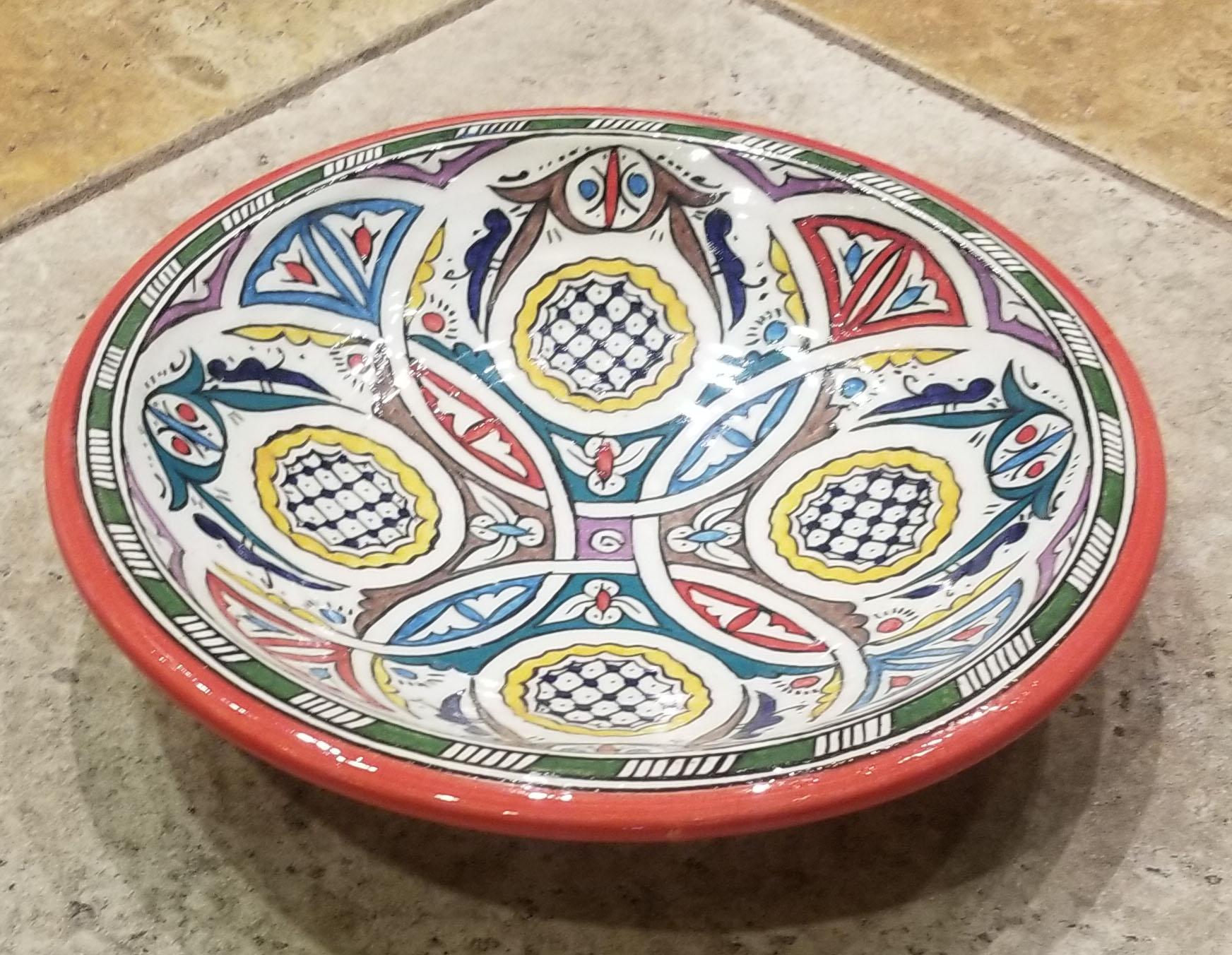 A rare or one of a kind exquisite Moroccan plate / charger not only for decoration purpose, but also to serve amazing food. This plate in hand painted and is multicolor. It would be a terrific add-on to any décor. Great Handcraftsmanship and