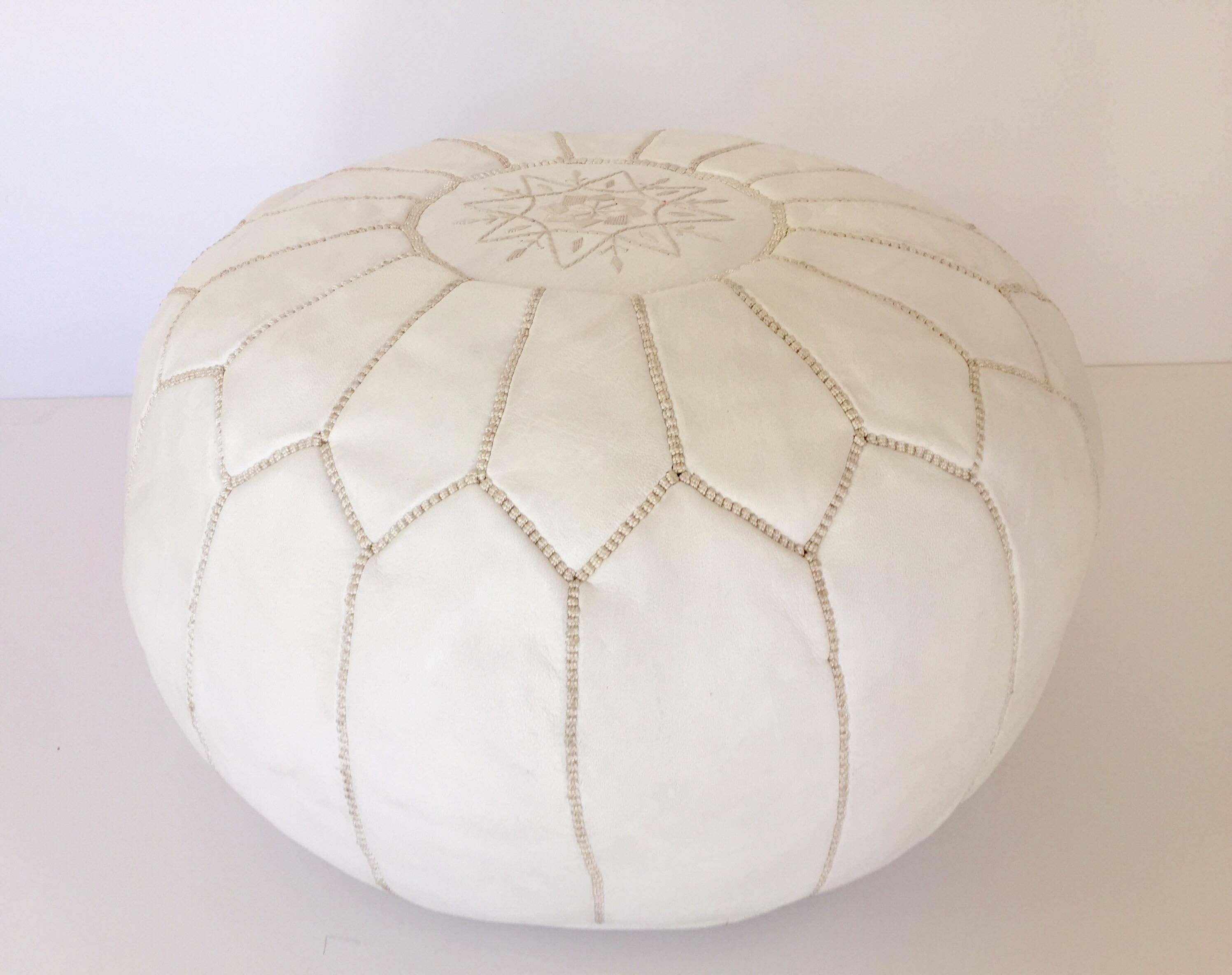 Vintage Moroccan white color round pouf hand tooled and embroidered in Marrakesh.
Beautiful geometrical designs are hand-stitched on this Moroccan stool by expert Artisan.
Use these round handcrafted poufs as ottoman or accent side table, they