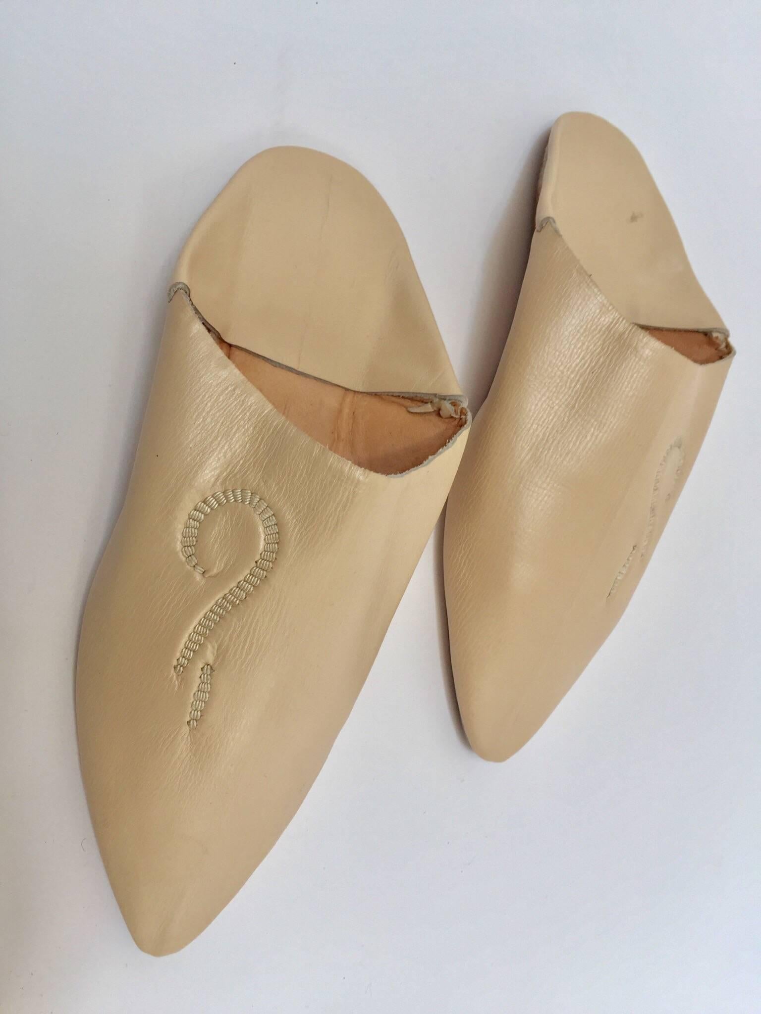 Moroccan leather slippers are handmade to perfection the inside sole is crafted of soft leather.
Hand-sewn sole and handcrafted in Fez Morocco. 
You won't want to take the Moroccan babouches off your feet.
Moroccan shoes to wear around the POOL or