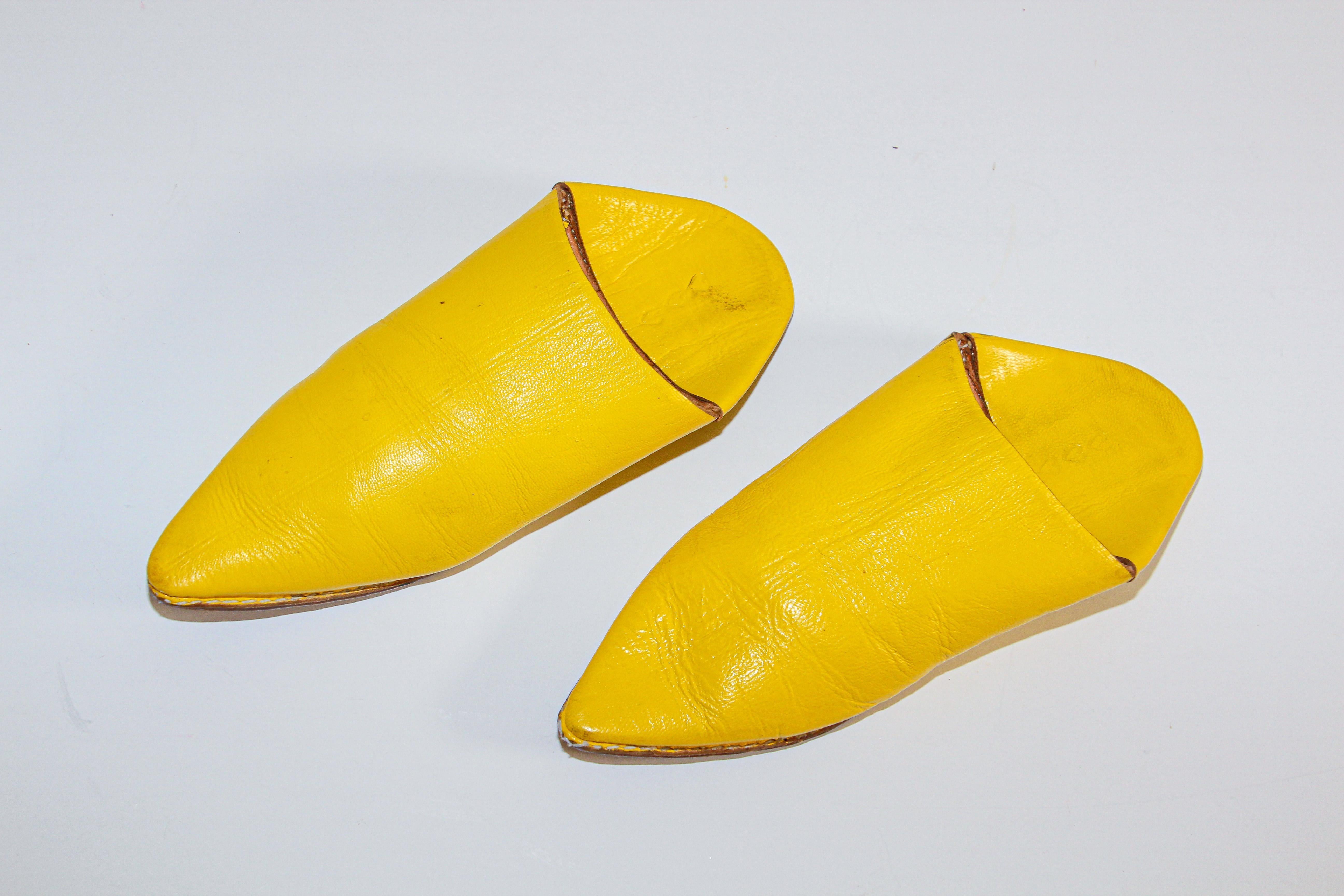 Moroccan yellow leather slippers are handmade to perfection the inside sole is crafted of soft leather.
Hand-sewn sole and handcrafted in Fez Morocco. 
You won't want to take the Moroccan babouches off your feet.
vintage Moroccan shoes to wear