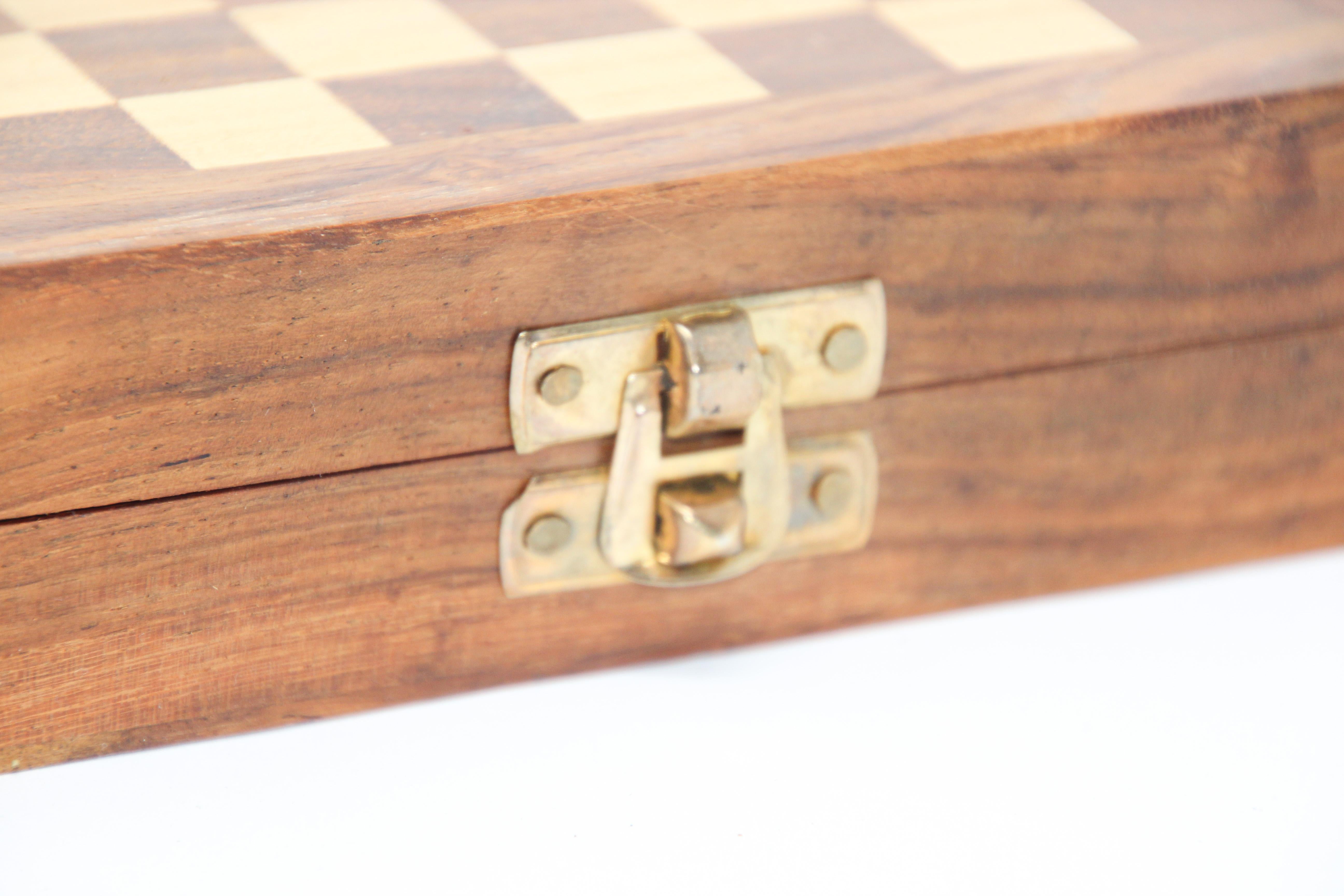 Decorative Moroccan chess handcrafted thuya wood box.
Moroccan artists continue the long tradition that creating beautiful and functional pieces from roots and branches of the rare Thuya tree. This wood can be found only in Atlas mountains in