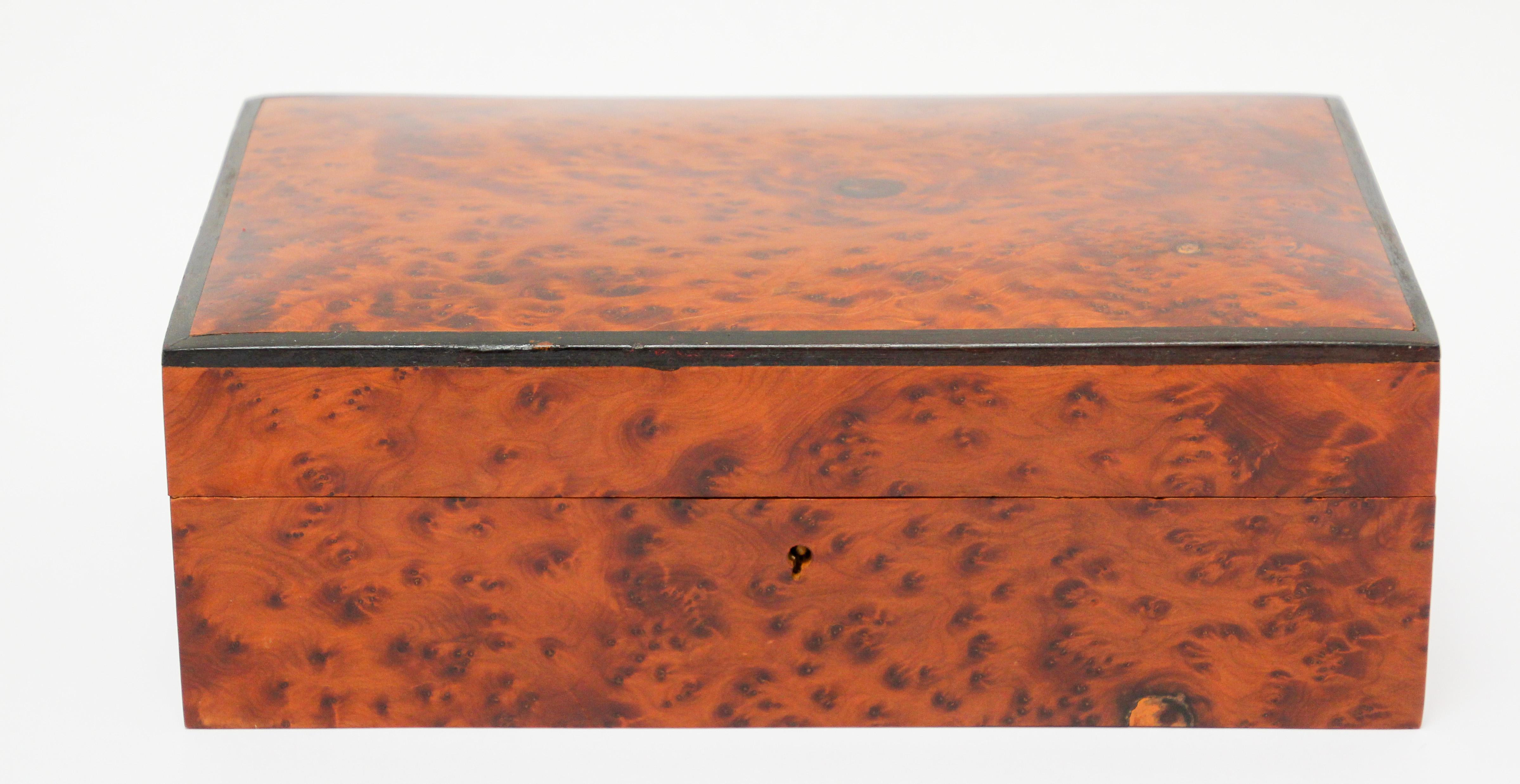 Beautiful handcrafted jewelry box burl wood box, Victorian, Napoleon style burl wood jewelry box.
Polished burl Thuya wood hand made with high quality craftsmanship. 
The hinged lid enclosing a divided interior with a with lift up tray great for