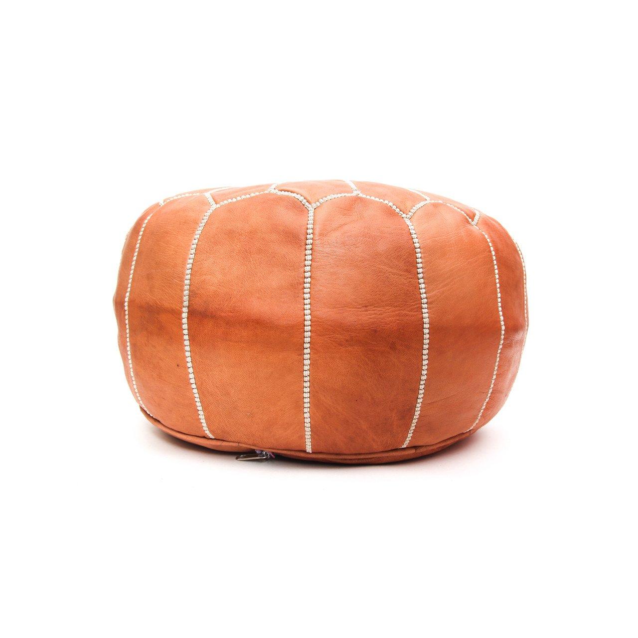 This eye-catching handstitched genuine tan leather pair of Moroccan Poufs will lend an air of regal majesty to your den or living room. Handcrafted in leather by master artisans and boasting a resplendent arabesque pattern, this pair of poufs is