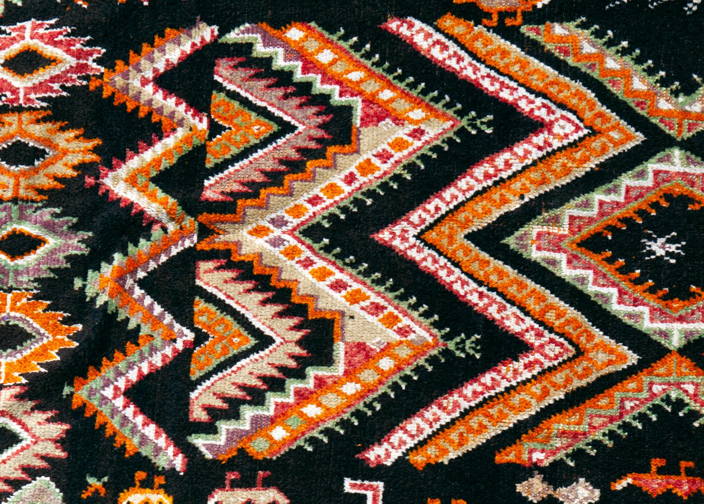 A one-of-a-kind oversized runner.
Woven in a tribal village that specializes in weaving these vivacious Berber patterns.
The wool has been vegetable dyed in earth tones.
Purchased from the personal collection of the late actress, Anne Hecht.