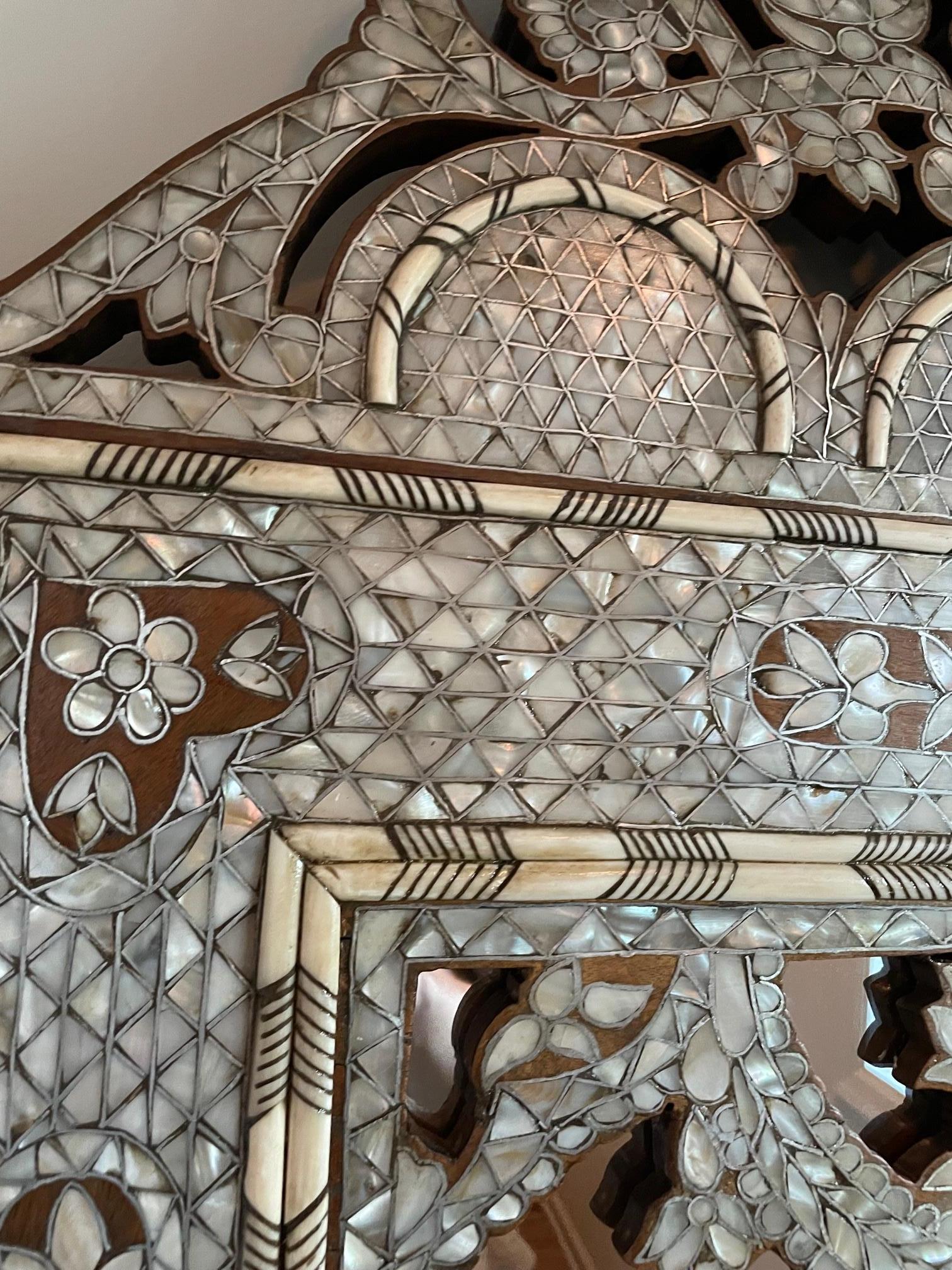 Moroccan bone and shell inlaid wall mirror. 20th century.
  